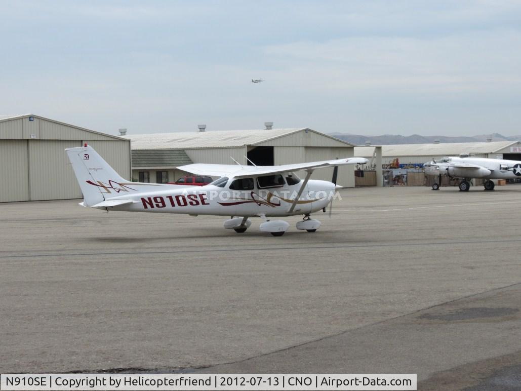 N910SE, 2006 Cessna 172S C/N 172S59604, Taxiing back to park as P-51 N5441V takes off westbound
