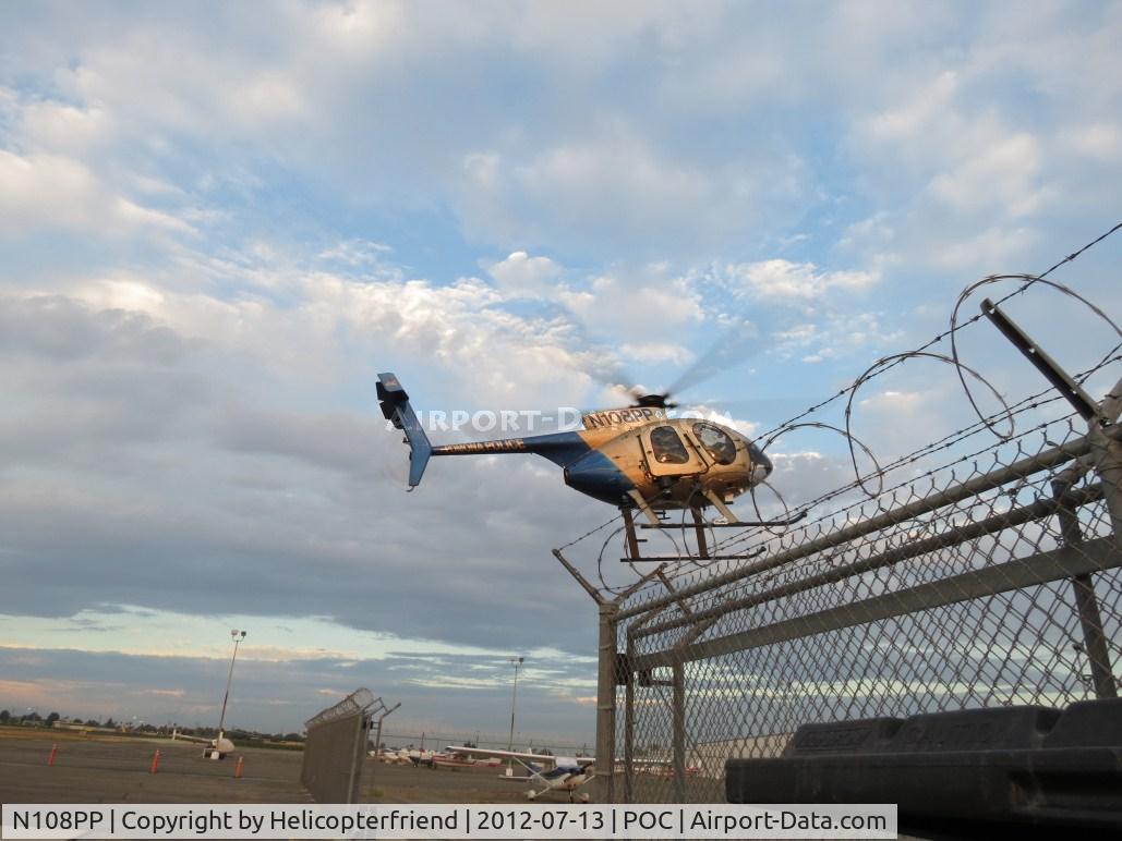 N108PP, 2008 MD Helicopters 369E C/N 0578E, Entering the helipad area through the open gate