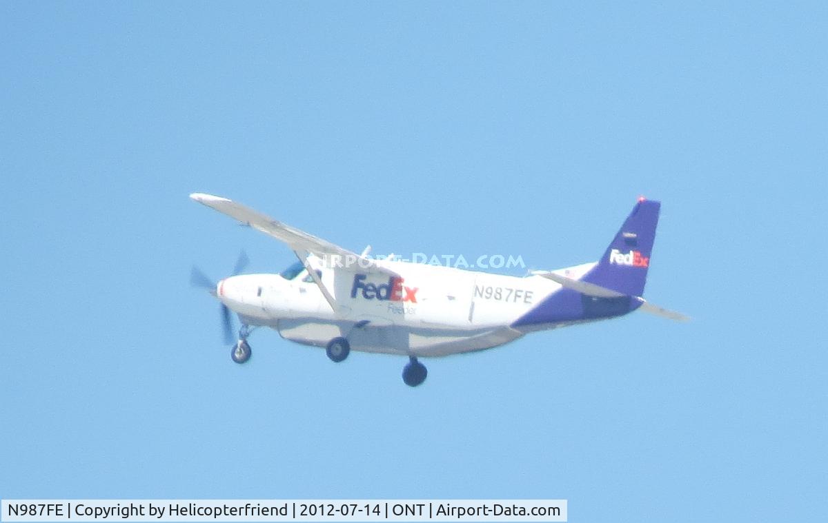 N987FE, 1989 Cessna 208B C/N 208B0201, Just took off and is turning southbound