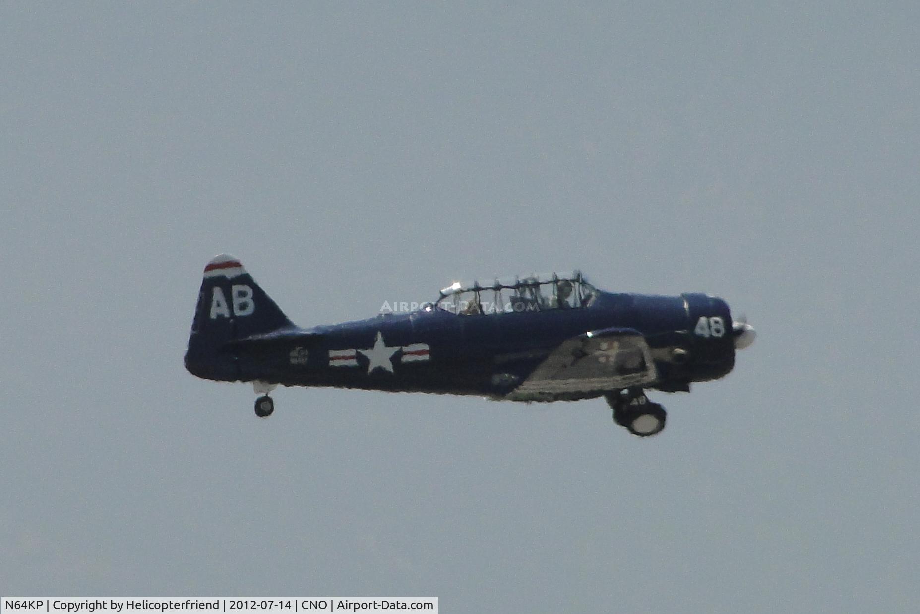 N64KP, 1943 North American AT-6D C/N 84936, Gear being retracted