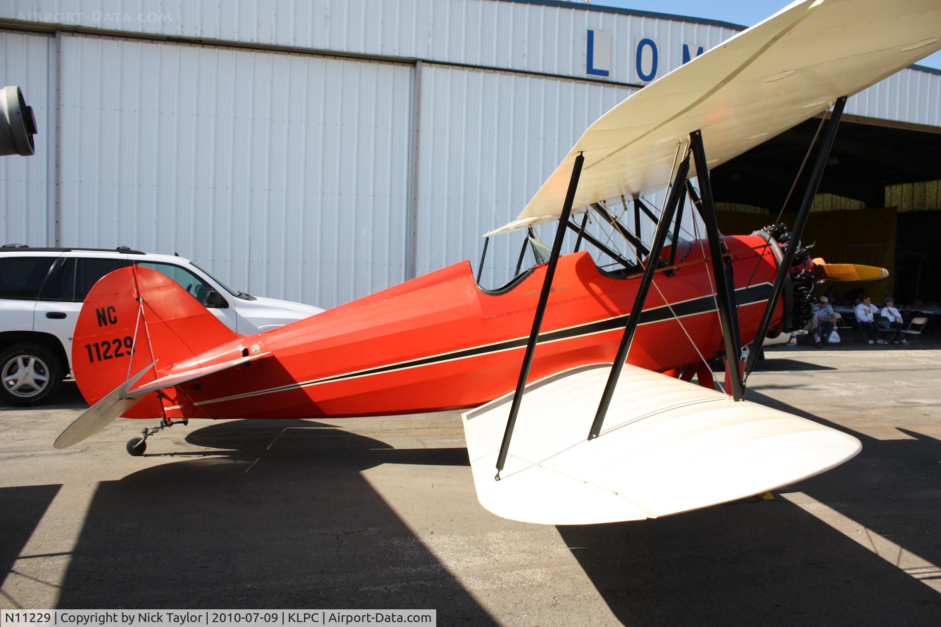 N11229, Waco RNF C/N 3456, Lompoc Piper Cub fly in 2010