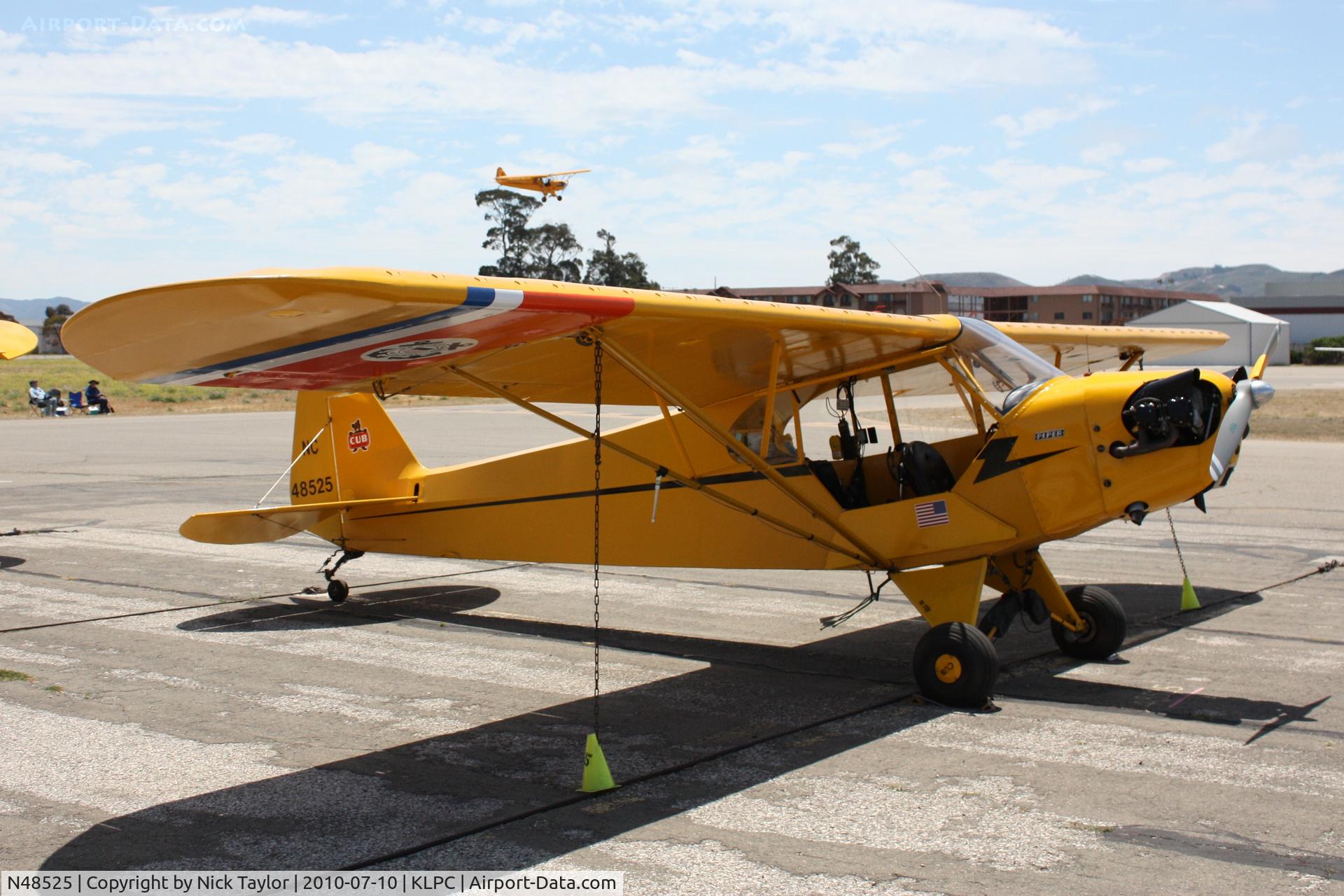 N48525, 1942 Piper J3C-65 Cub Cub C/N 9441, Lompoc Piper Cub fly in 2010