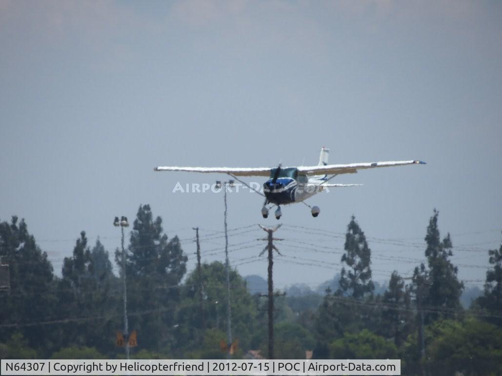 N64307, 1975 Cessna 172M C/N 17265157, Over the threshold 26L