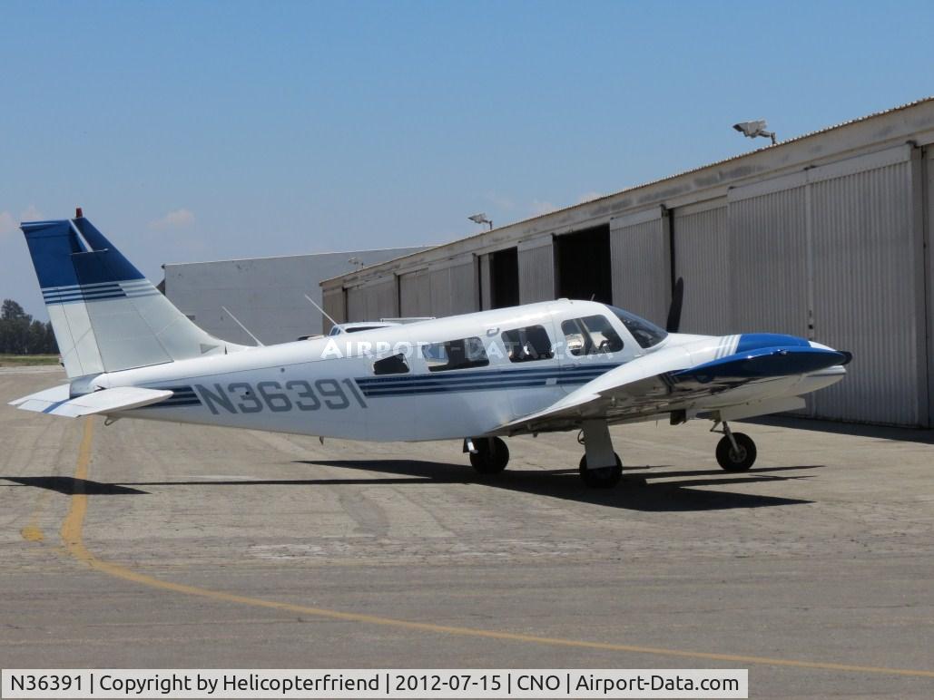 N36391, 1978 Piper PA-34-200T C/N 34-7870326, Parked near a hanger