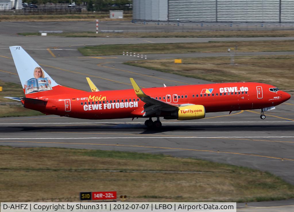 D-AHFZ, 2001 Boeing 737-8K5 C/N 30883, Landing rwy 14R in Cewe Fotobuch c/s