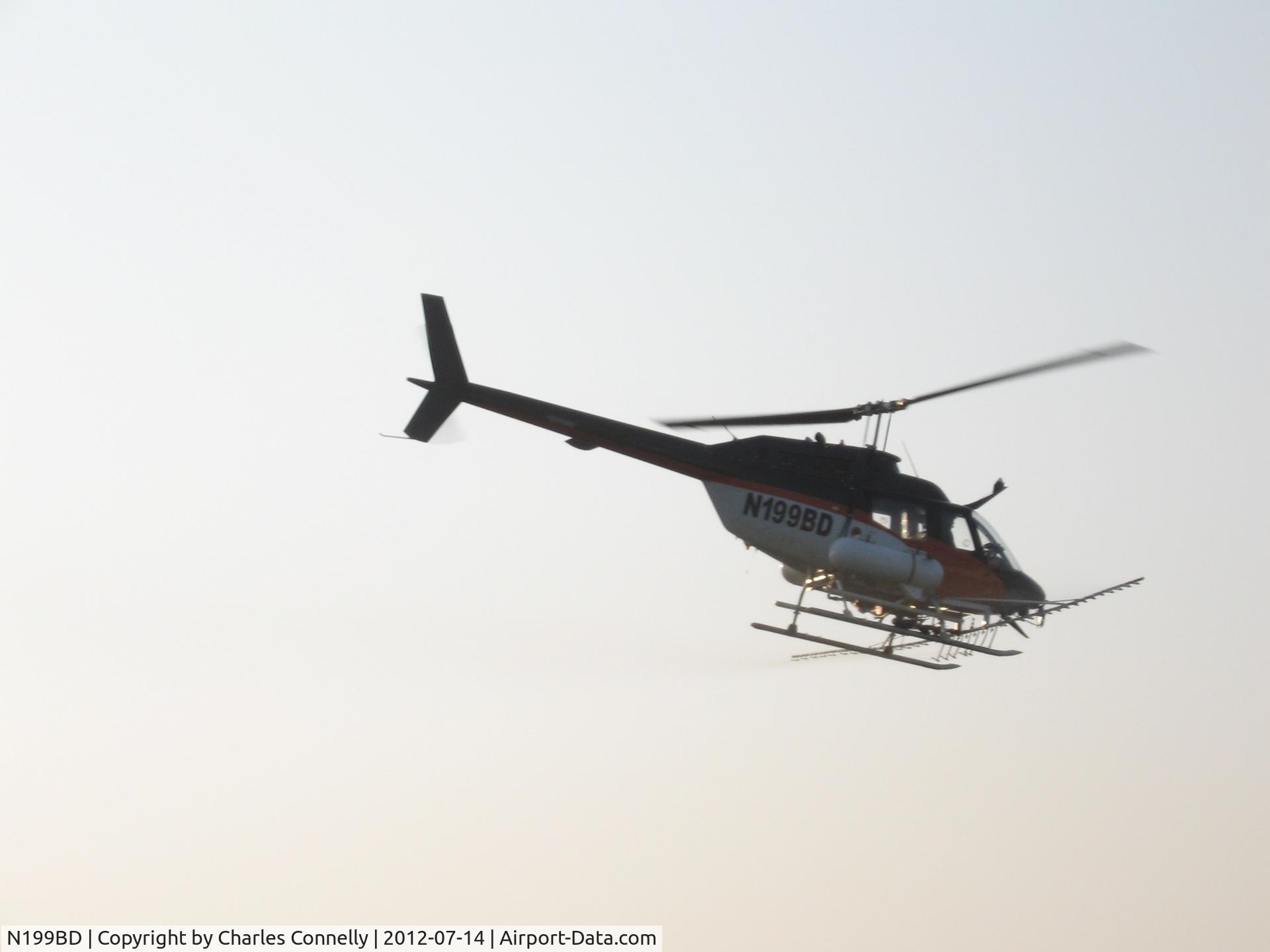 N199BD, 1970 Bell OH-58A Kiowa C/N 40834, Applying fungiside on my corn acres.
