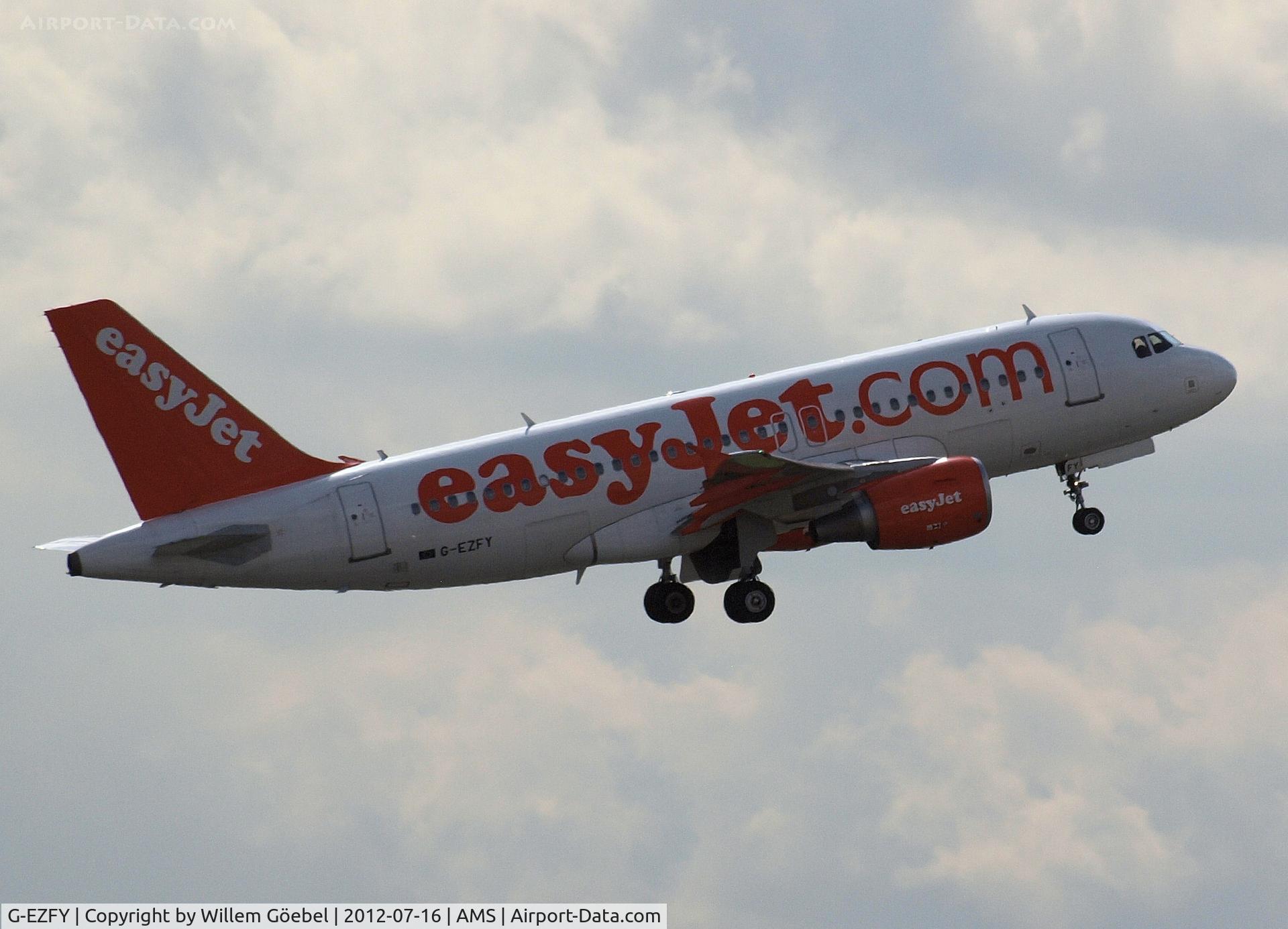 G-EZFY, 2010 Airbus A319-111 C/N 4418, Take off from runway L18 of Schiphol Airport