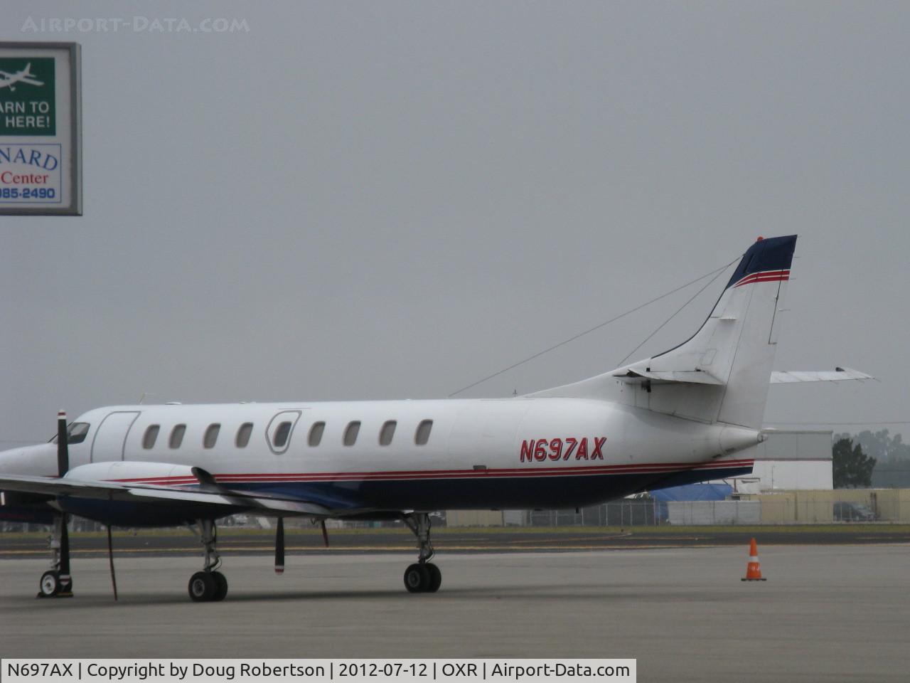 N697AX, 1987 Fairchild SA-227AC Metro III C/N AC-697, 1987 Fairchild SA-227-AC METRO III, two Garrett AiResearch TPE331-11U-612G Turboprops, 1,000 shp each. Four-blade props, Pressurized, Max speed 344 mph, cruise 318 mph. Corrected for airport.