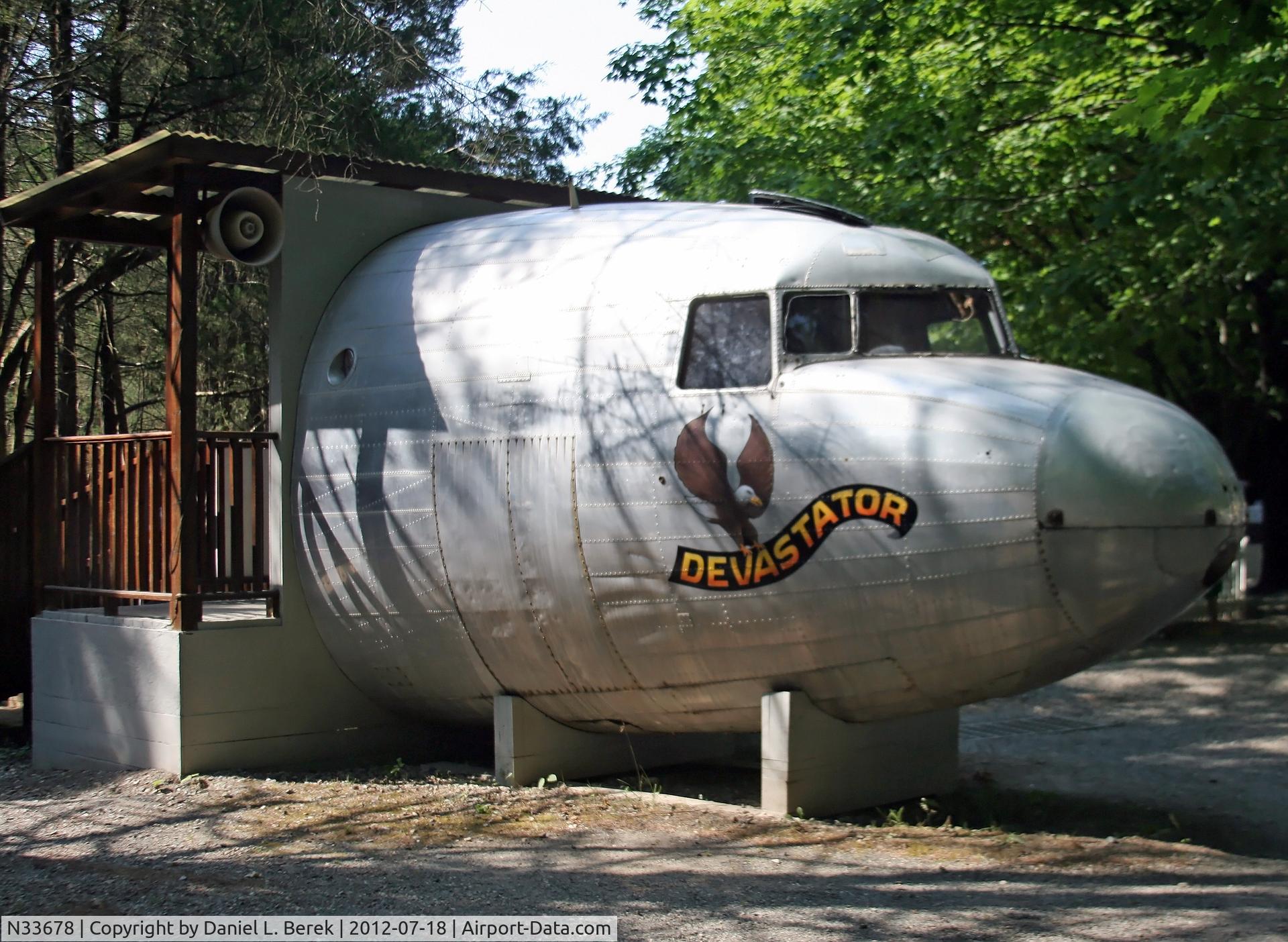 N33678, 1941 Douglas DC-3-G202A (C-49H) C/N 4133, After a long career as an airliner, US Army VIP transport, and executive transport, the forward fuselage was brought to the Land of Make Believe, Hope, NJ.