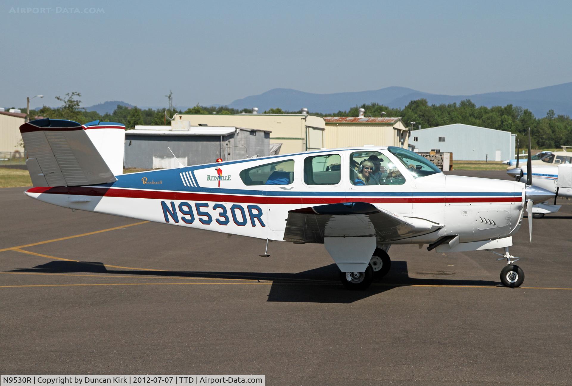 N9530R, 1959 Beech K35 Bonanza C/N D-6077, Taxiing out at Troutdale
