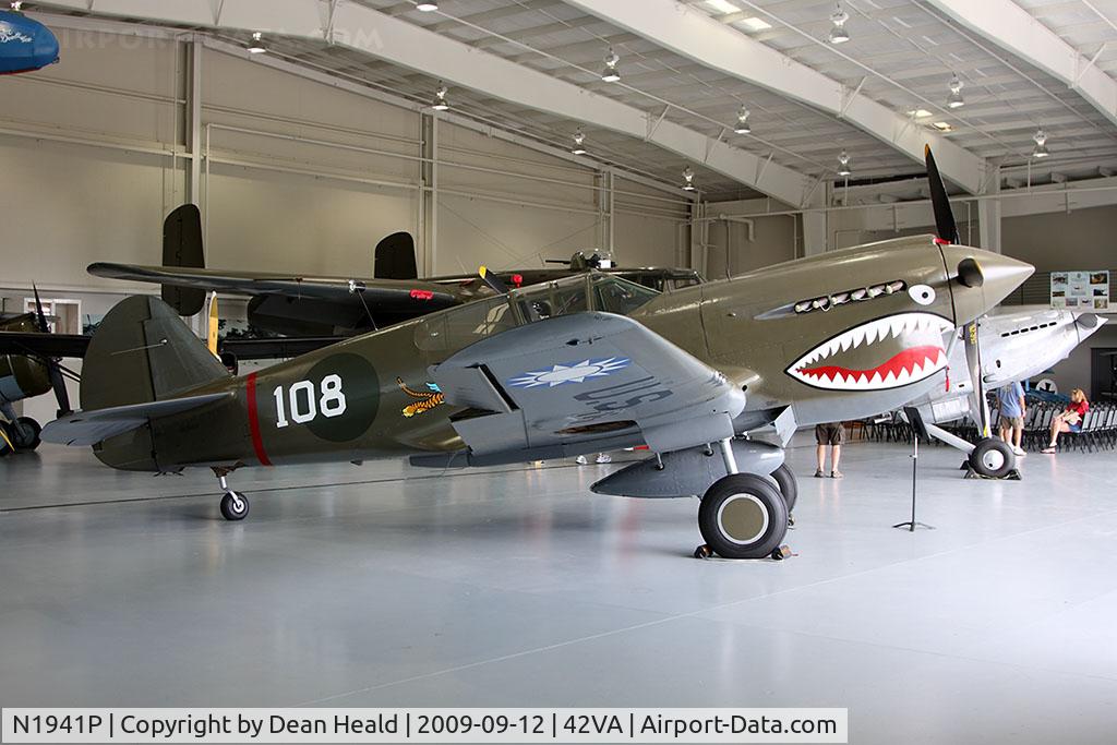 N1941P, 1941 Curtiss P-40E C/N 1025, 1941 Curtiss Wright P-40E Kittyhawk N1941P parked in the hangar at the Military Aviation Museum.