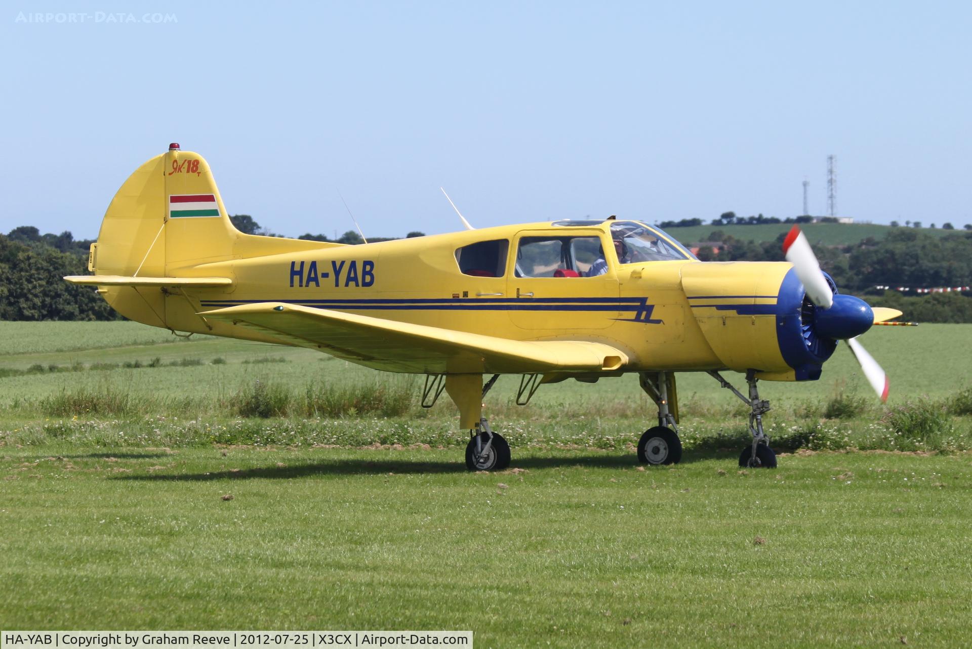HA-YAB, 1999 Yakovlev Yak-18T C/N 12-35, Just landed.