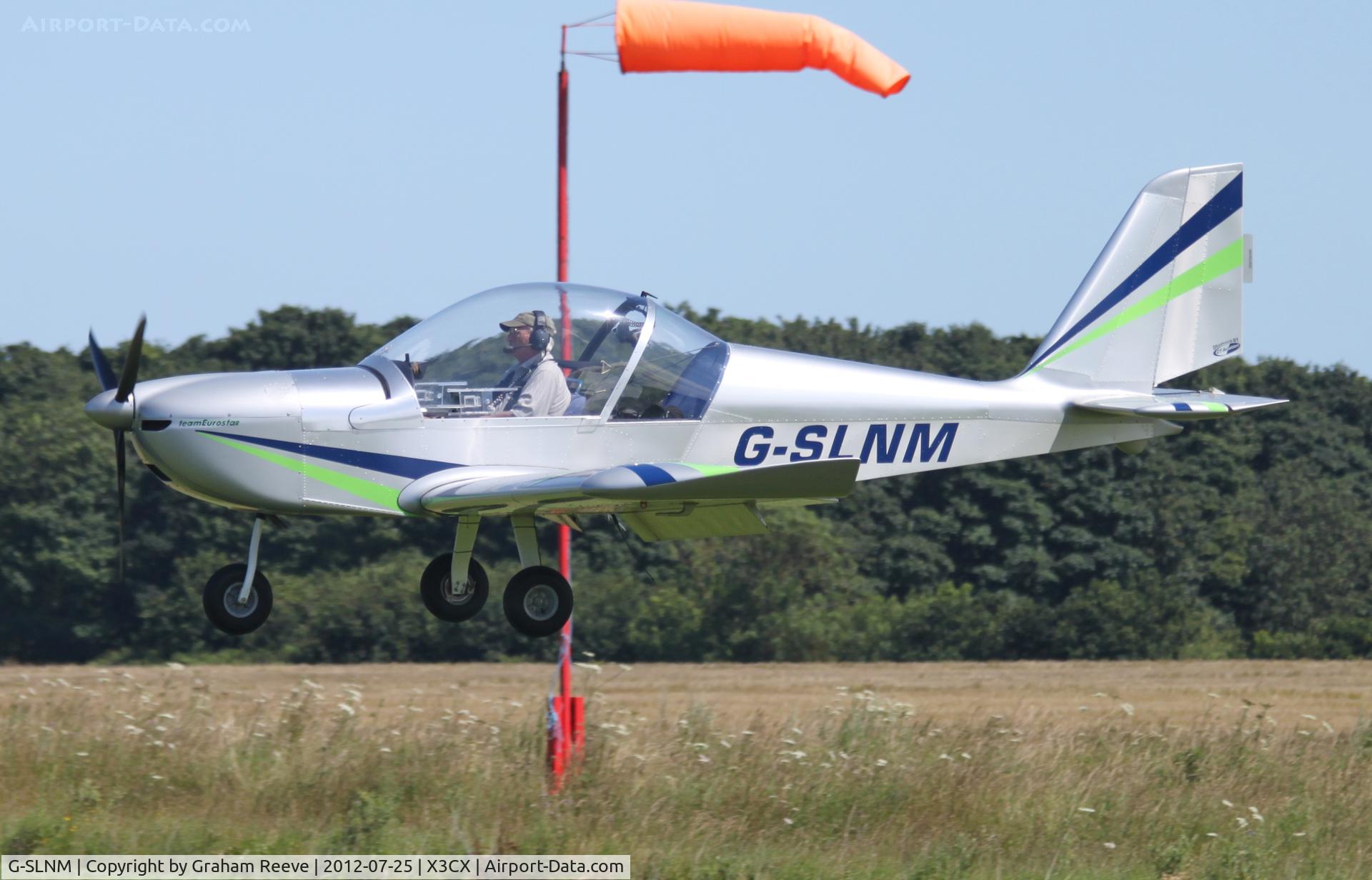 G-SLNM, 2010 Cosmik EV-97 TeamEurostar UK C/N 3717, About to touch down.