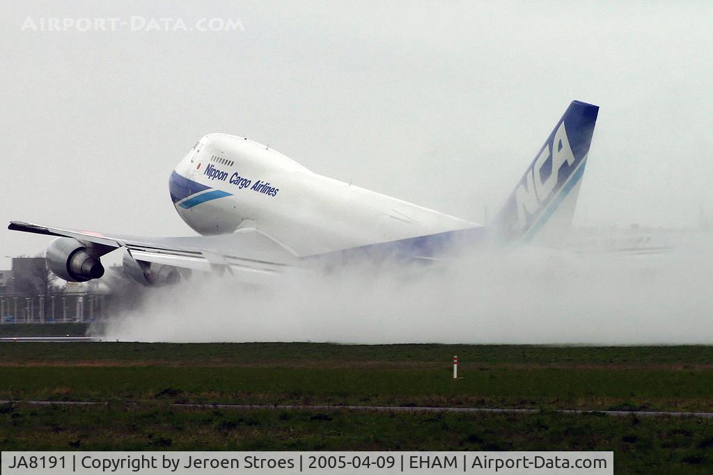 JA8191, 1990 Boeing 747-281F C/N 24576, rainy day