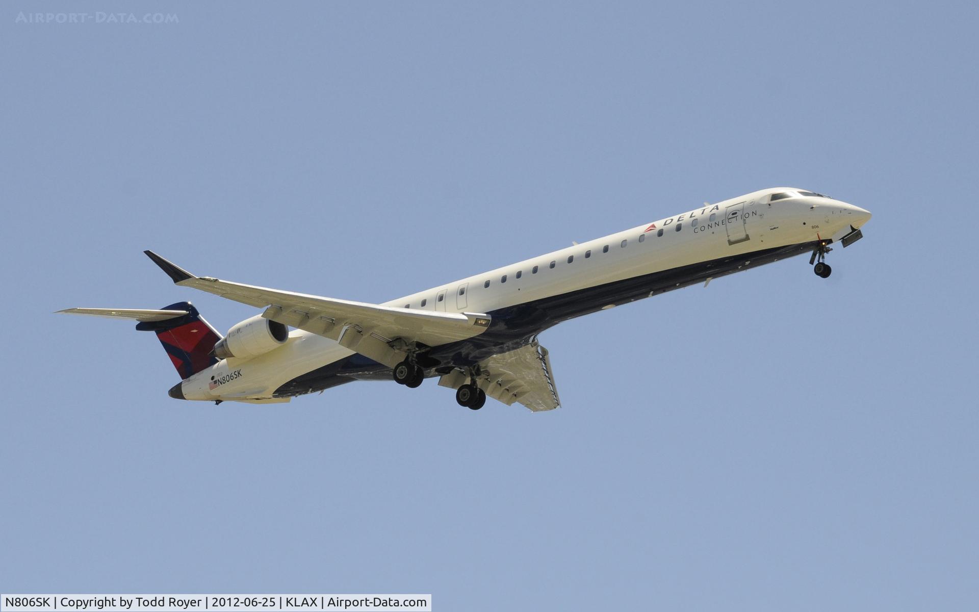N806SK, 2006 Bombardier CRJ-900ER (CL-600-2D24) C/N 15070, Arriving at LAX on 24R