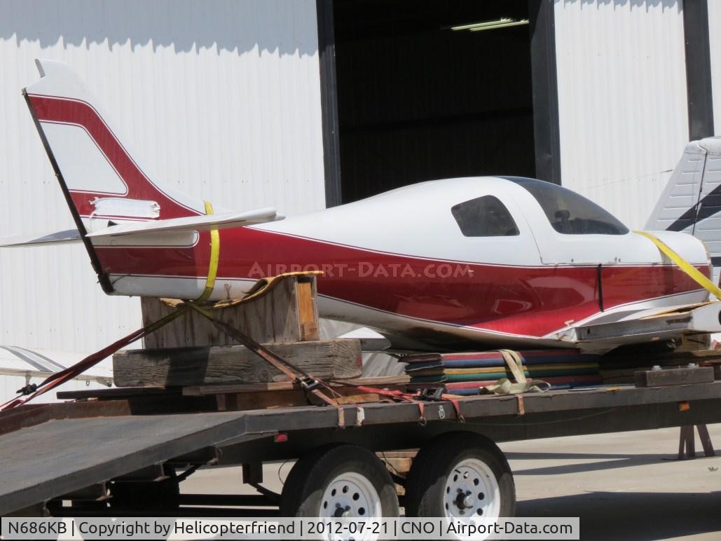 N686KB, 1992 Fisher Harold R 320 C/N 507, Parked with no wings, no engine on a trailer:  NTSB report WPR12CA270 