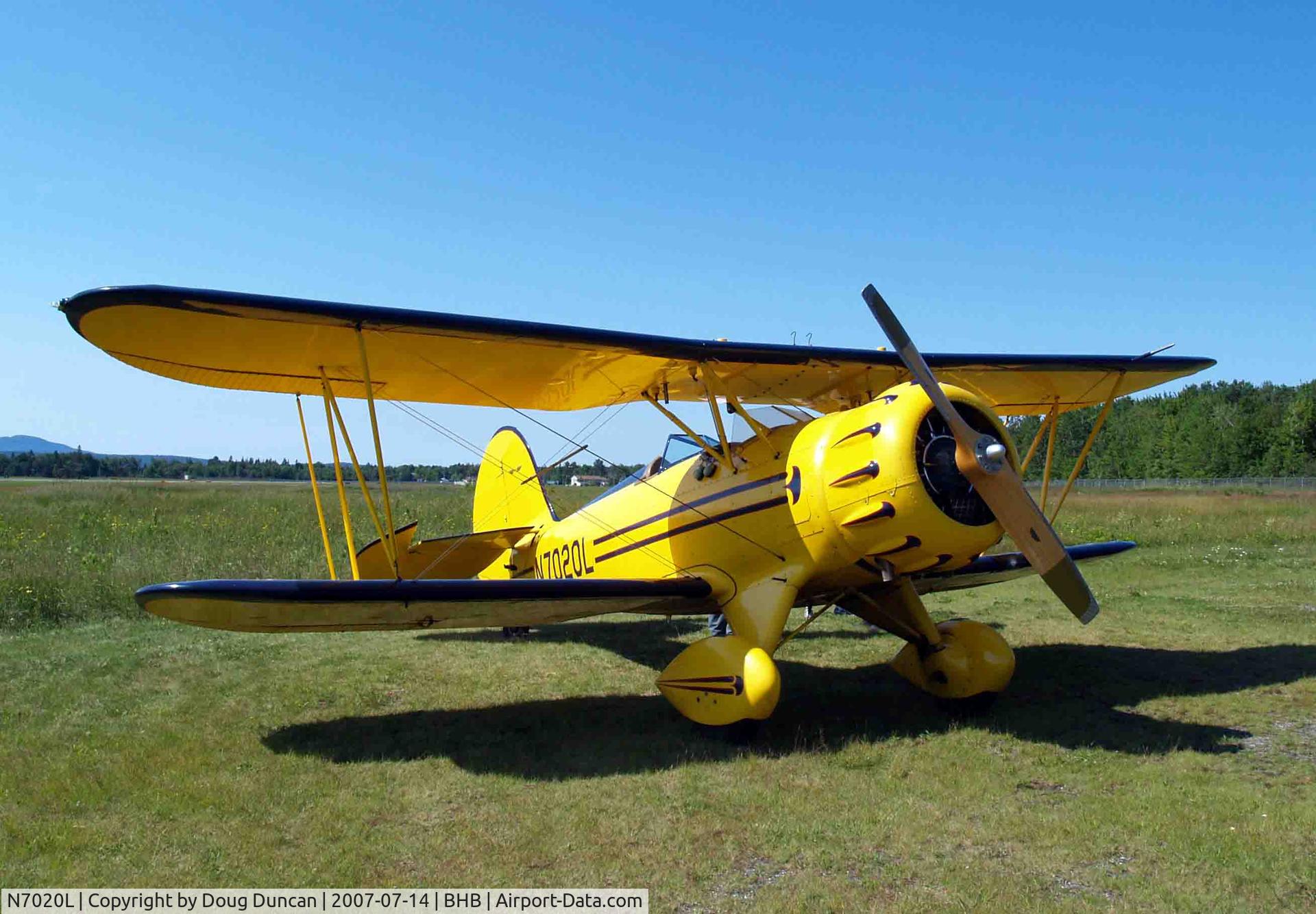 N7020L, 1999 Waco YMF-F5C C/N F5C085, Seen at Hancock County Airport in Bar Harbor, Maine, where it performs aerial tours of Mt Desert Island in the summer months.