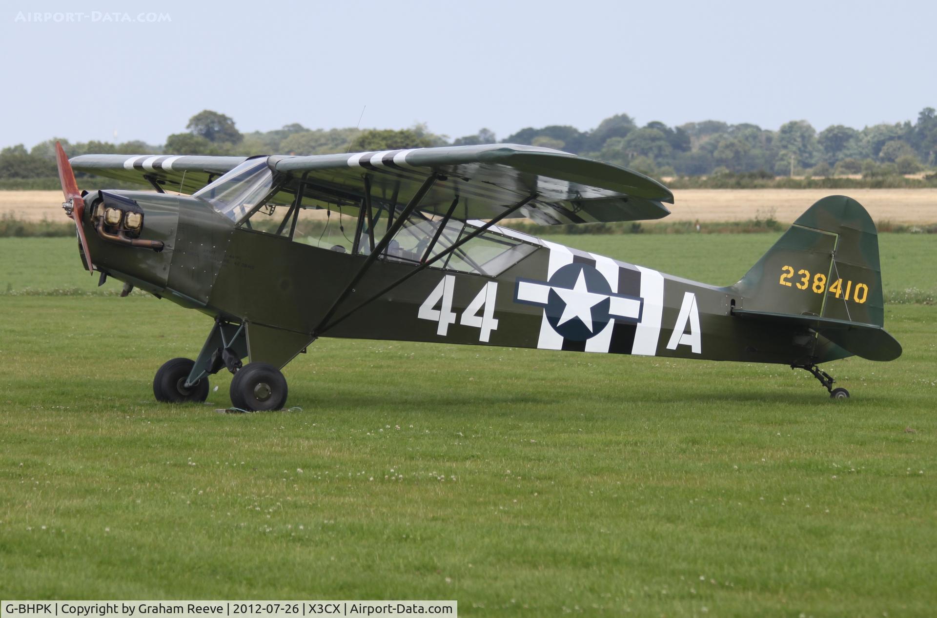 G-BHPK, 1943 Piper L-4H Grasshopper (J3C-65D) C/N 12161, Parked at Northrepps.
