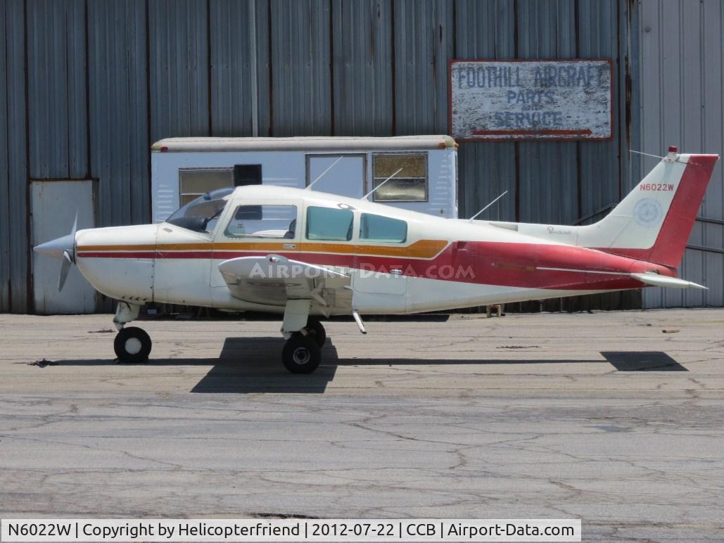 N6022W, 1979 Beech C23 Sundowner 180 C/N M-2153, Parked by the electronics shop