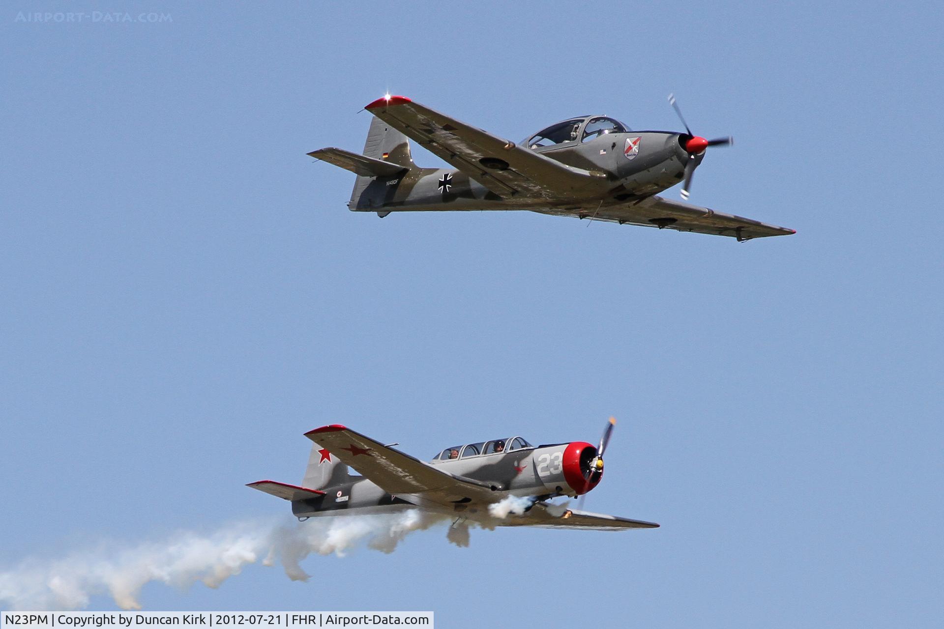 N23PM, 1978 Nanchang CJ-6 C/N 3832012, N23PM flies by with Piaggio P149 N149DF at the Friday Harbor Fly-in