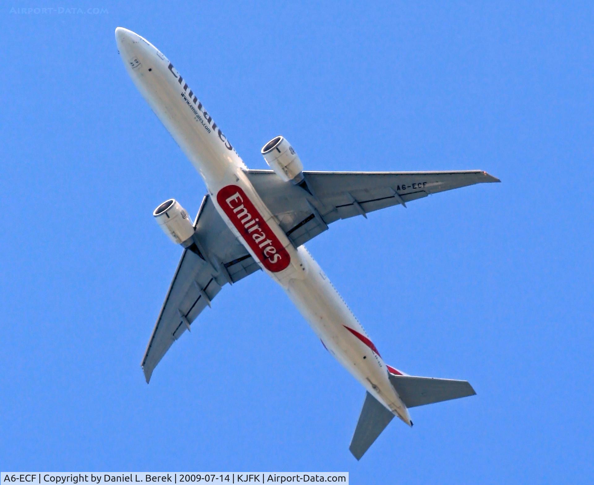 A6-ECF, 2007 Boeing 777-36H/ER C/N 35574, A new Emirates stretched Triple-Seven soars overhead, taking off from JFK and overflying Floyd Bennett Field.