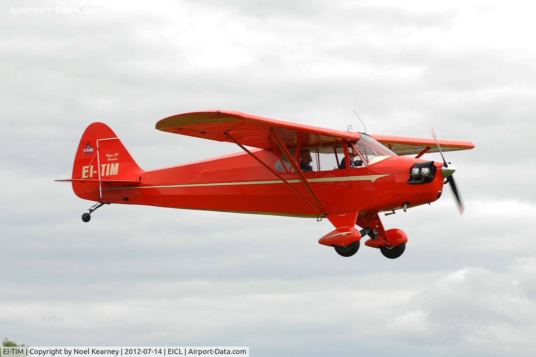 EI-TIM, 1940 Piper J-5A Cub Cruiser Cub Cruiser C/N 5-36, Landing at the Clonbullogue Fly-in July 2012