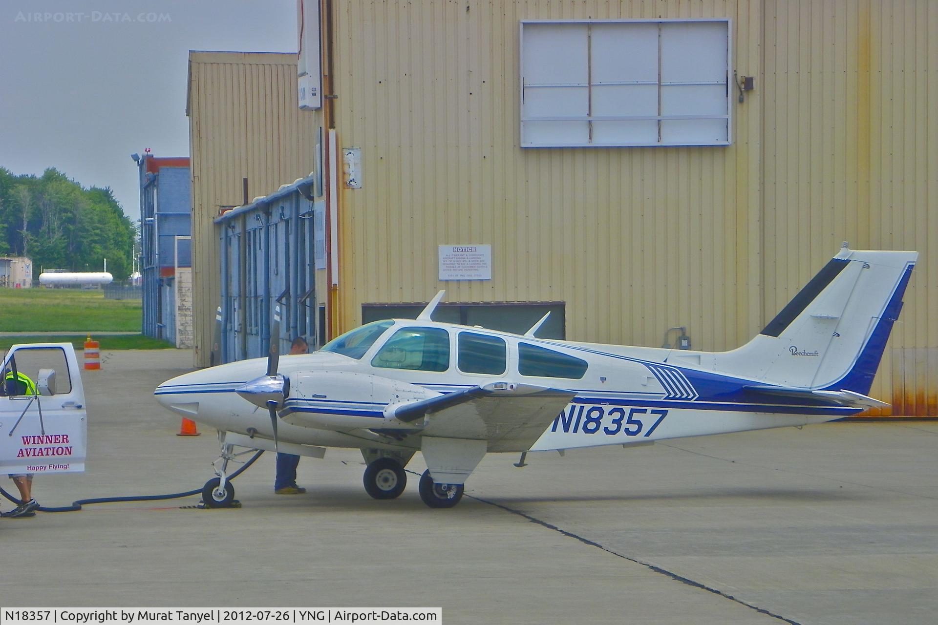 N18357, 1977 Beech 95-B55 (T42A) Baron C/N TC-2078, Fueling up at YNG