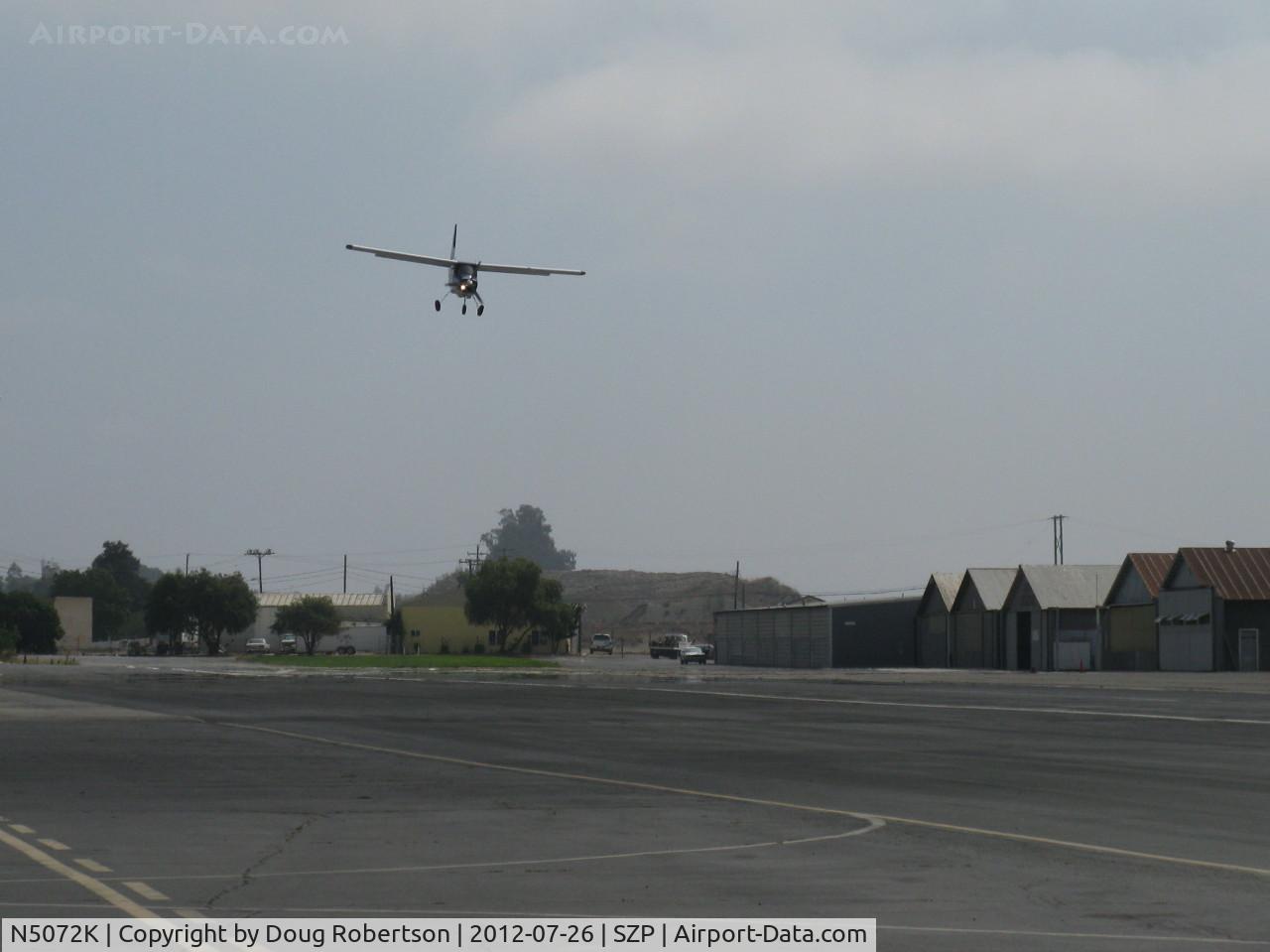 N5072K, 1967 Helio H-295-1200 Super Courier C/N 1251, 1967 Helio H-295 SUPER COURIER STOL conversion to HT-295 tri-gear. Lycoming GO-480-G1D6 295 Hp, on steep final for Rwy 22