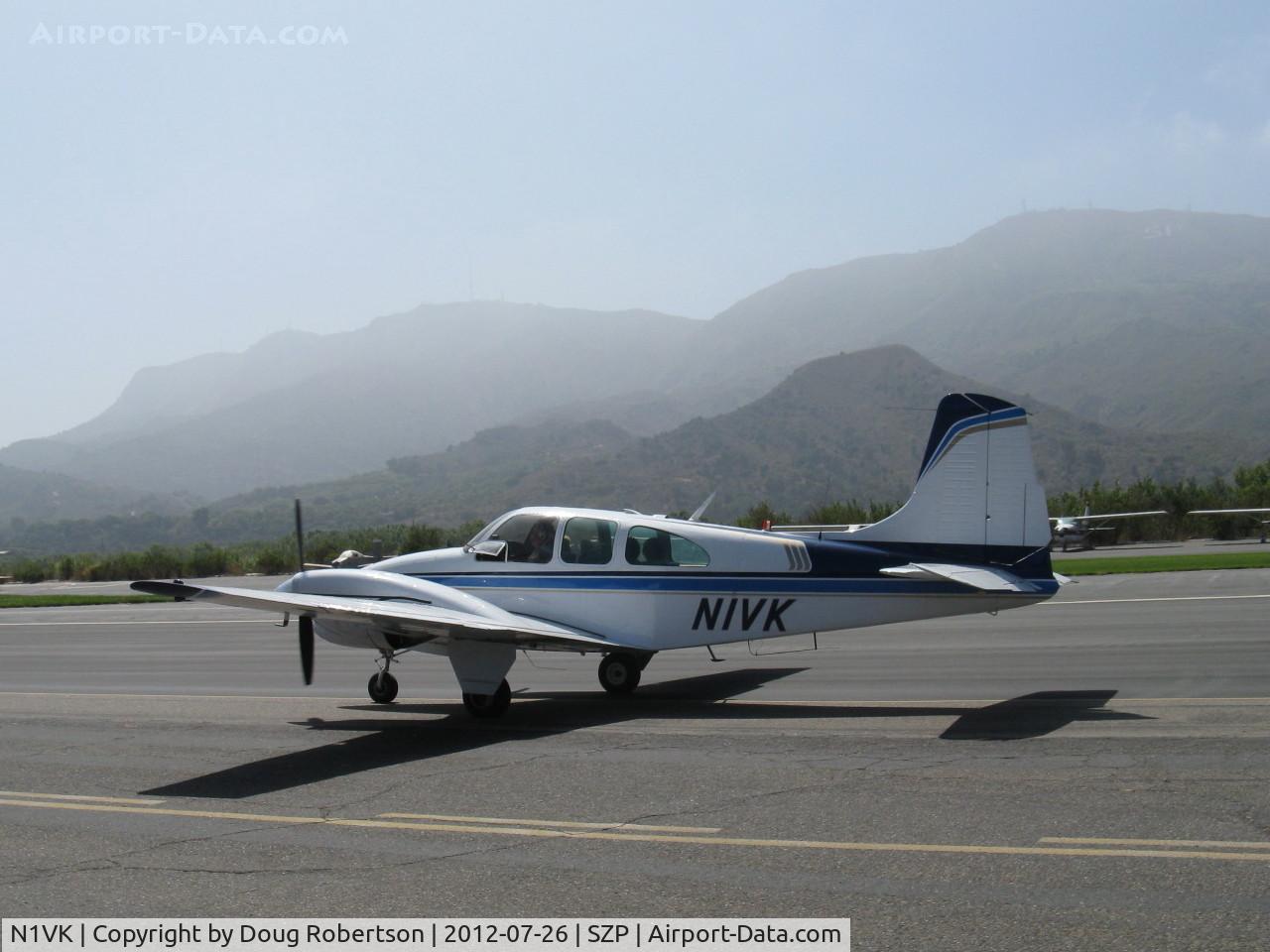 N1VK, 1960 Beech B95 Travel Air C/N TD-403, 1960 Beech B95 TRAVEL AIR, two Lycoming O&VO-360s 180 Hp each. Beech built 150 B95s. Taxi back after landing Rwy 22.