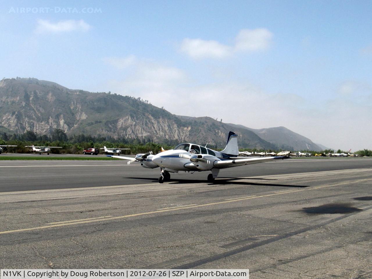 N1VK, 1960 Beech B95 Travel Air C/N TD-403, 1960 Beech B95 TRAVEL AIR, two Lycoming O&VO-360s 180 Hp each, taxi back after landing Rwy 22