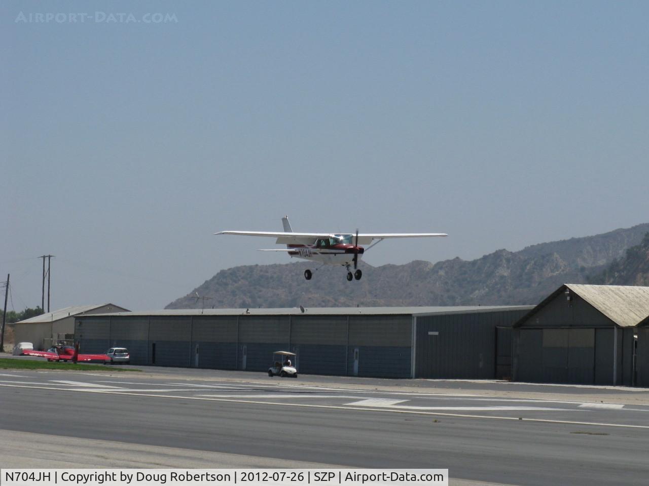N704JH, 1976 Cessna 150M C/N 15078644, 1976 Cessna 150M, Continental O-200 100 Hp, another on final Rwy 22