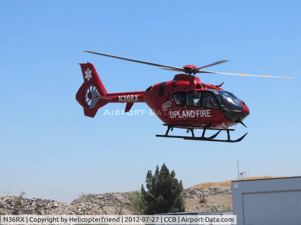N36RX, Eurocopter EC-135P-2+ C/N 0859, Upland Fire 1 lifting off and heading west