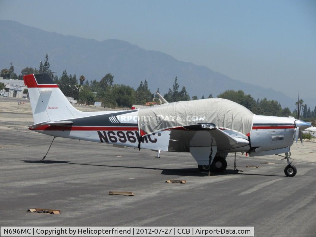 N696MC, 1990 Beech F33A Bonanza C/N CE-1476, Covered up, chained down and parked in transient parking