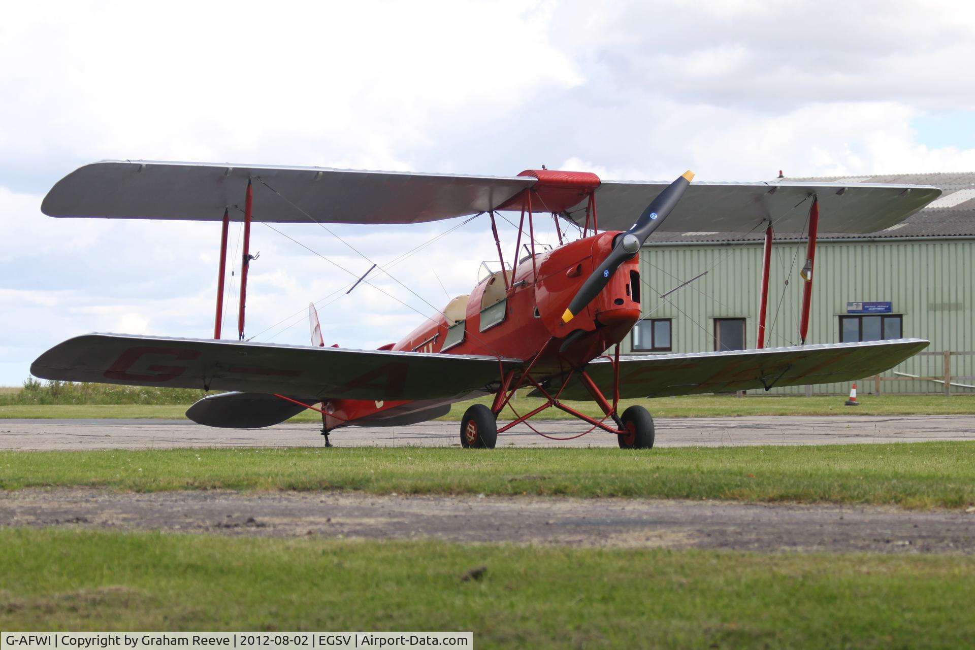 G-AFWI, 1939 De Havilland DH-82A Tiger Moth II C/N 82187, Parked at Old Buckenham.