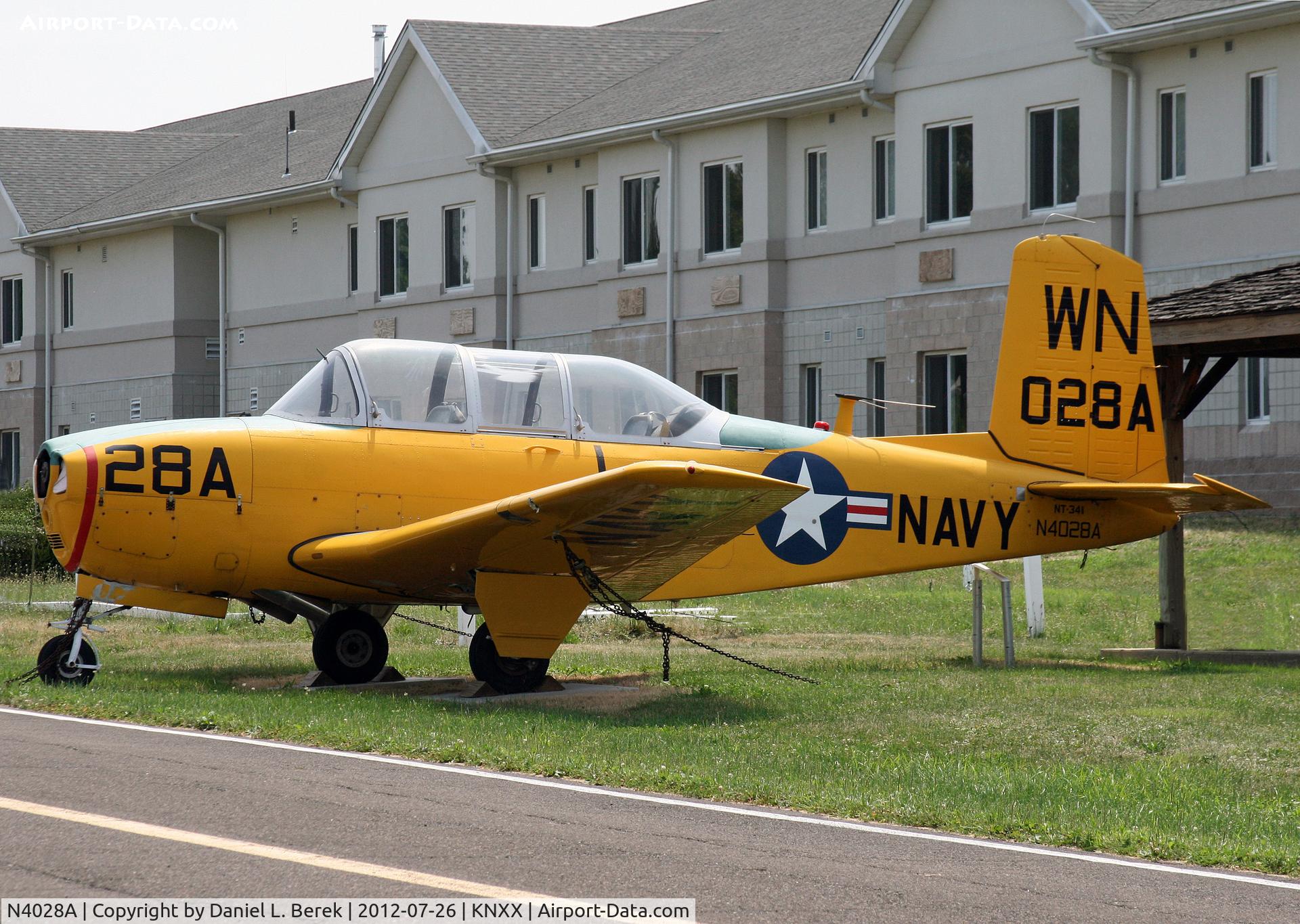 N4028A, 1961 Beech D-45 Mentor C/N BG-297, This poor Beech T34A Mentor, built 1965, suffered a gear-up landing, causing a bent prop.  She was donated to the Wings of Freedom museum, with whom she will eventually be restored.