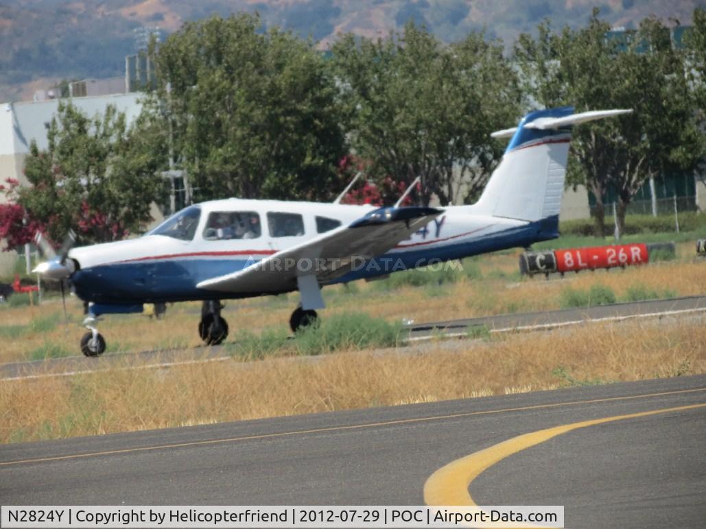 N2824Y, 1979 Piper PA-28RT-201 Arrow IV C/N 28R-7918161, Touching down on 26L