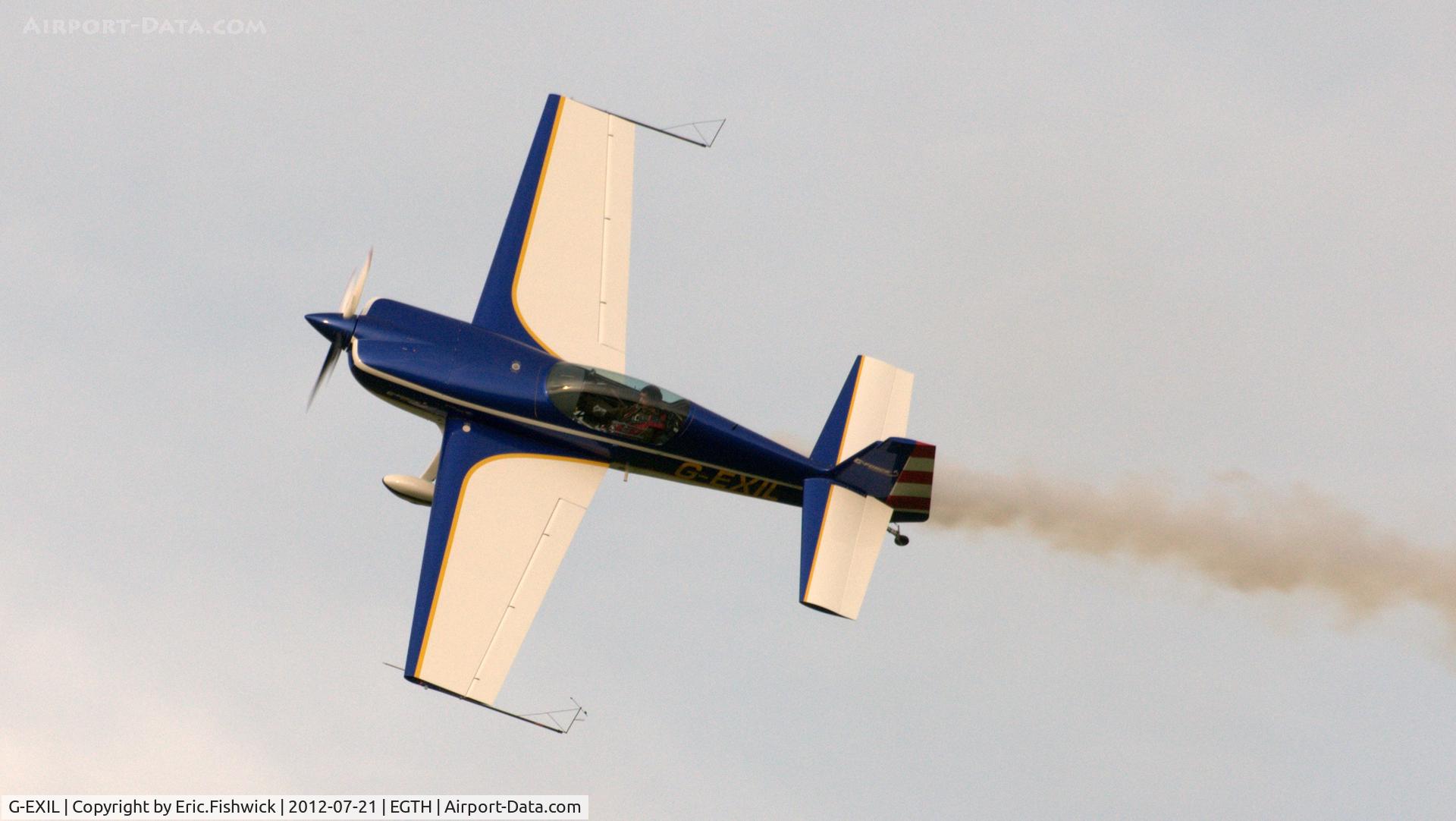 G-EXIL, 2010 Extra EA-300S C/N 1036, a. G-EXIL at Shuttleworth Sunset Air Display, July 2012