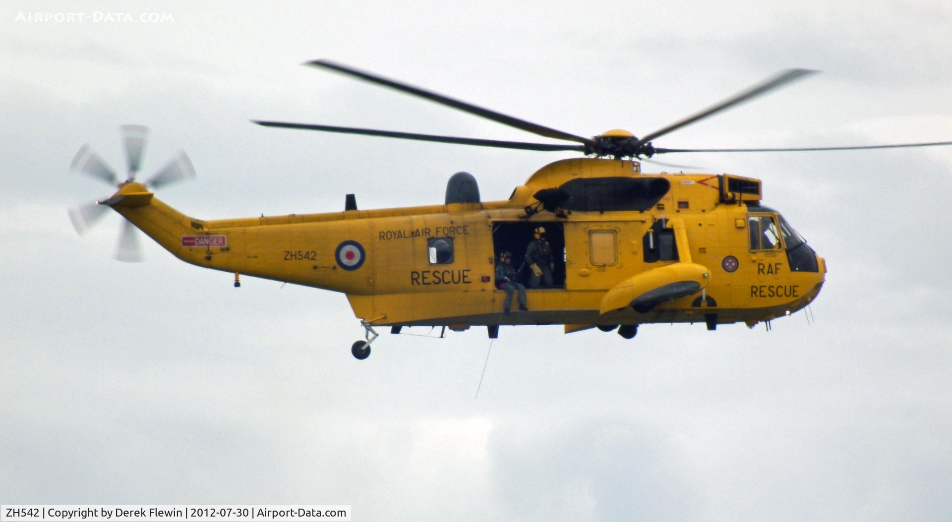 ZH542, Westland Sea King HAR.3A C/N WA1008, Landside, Crossing Bracelet Bay for winching exercise at Swansea Coast Guard Station.