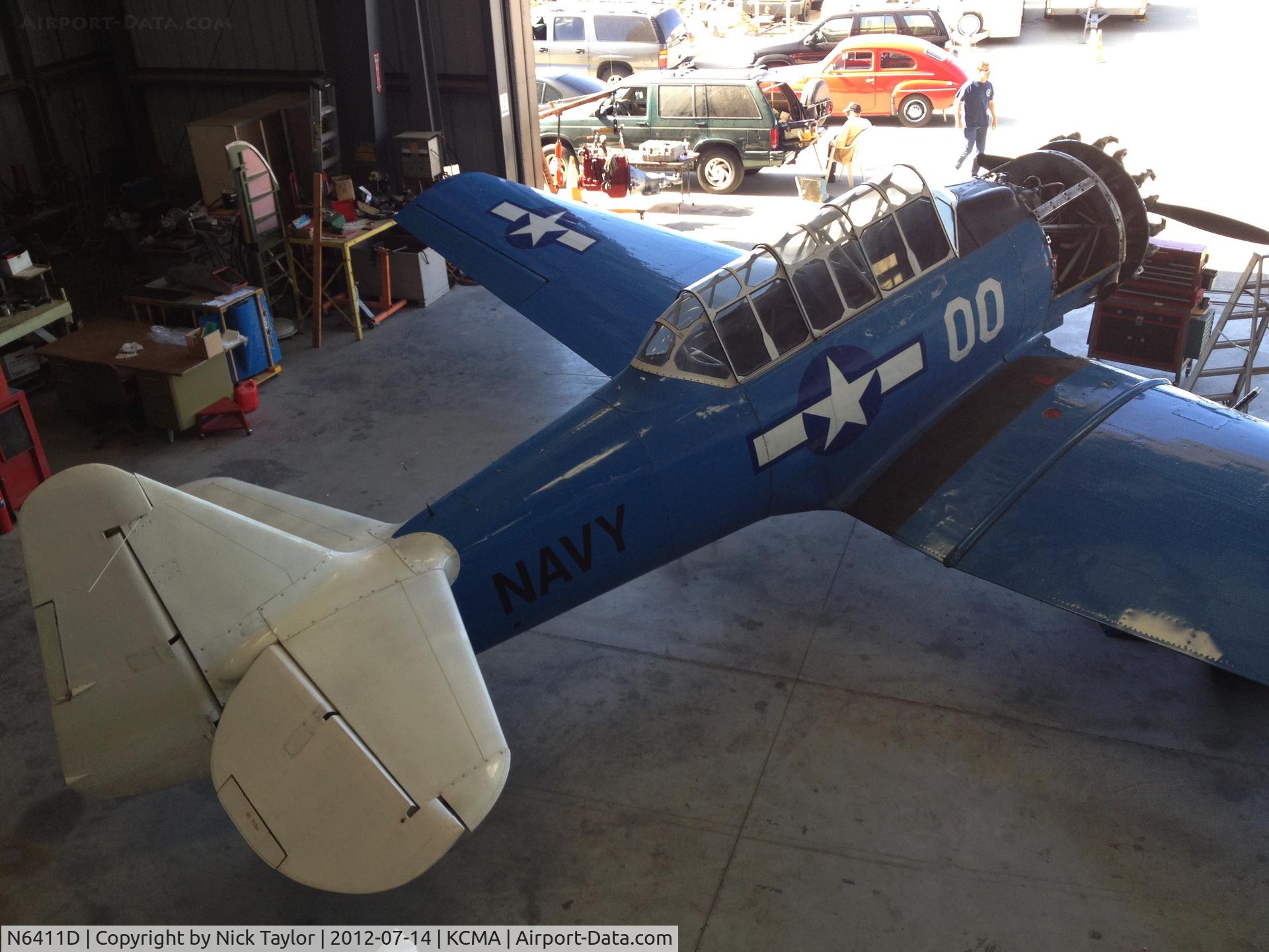 N6411D, 1942 North American SNJ-4 Texan C/N 88-10117, In the CAF hangar being worked on