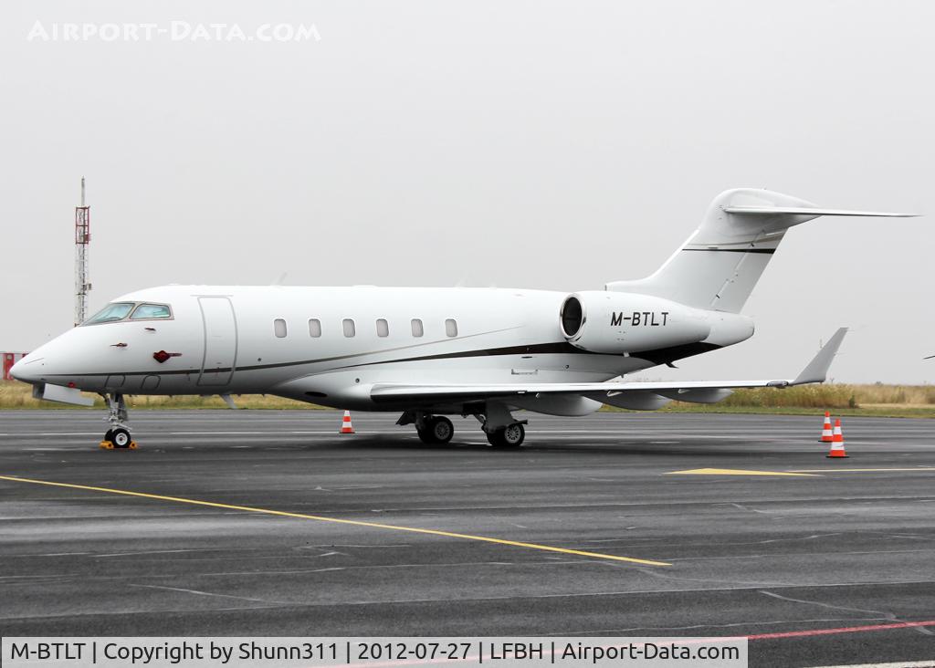 M-BTLT, 2005 Bombardier Challenger 300 (BD-100-1A10) C/N 20042, Parked near the control tower...
