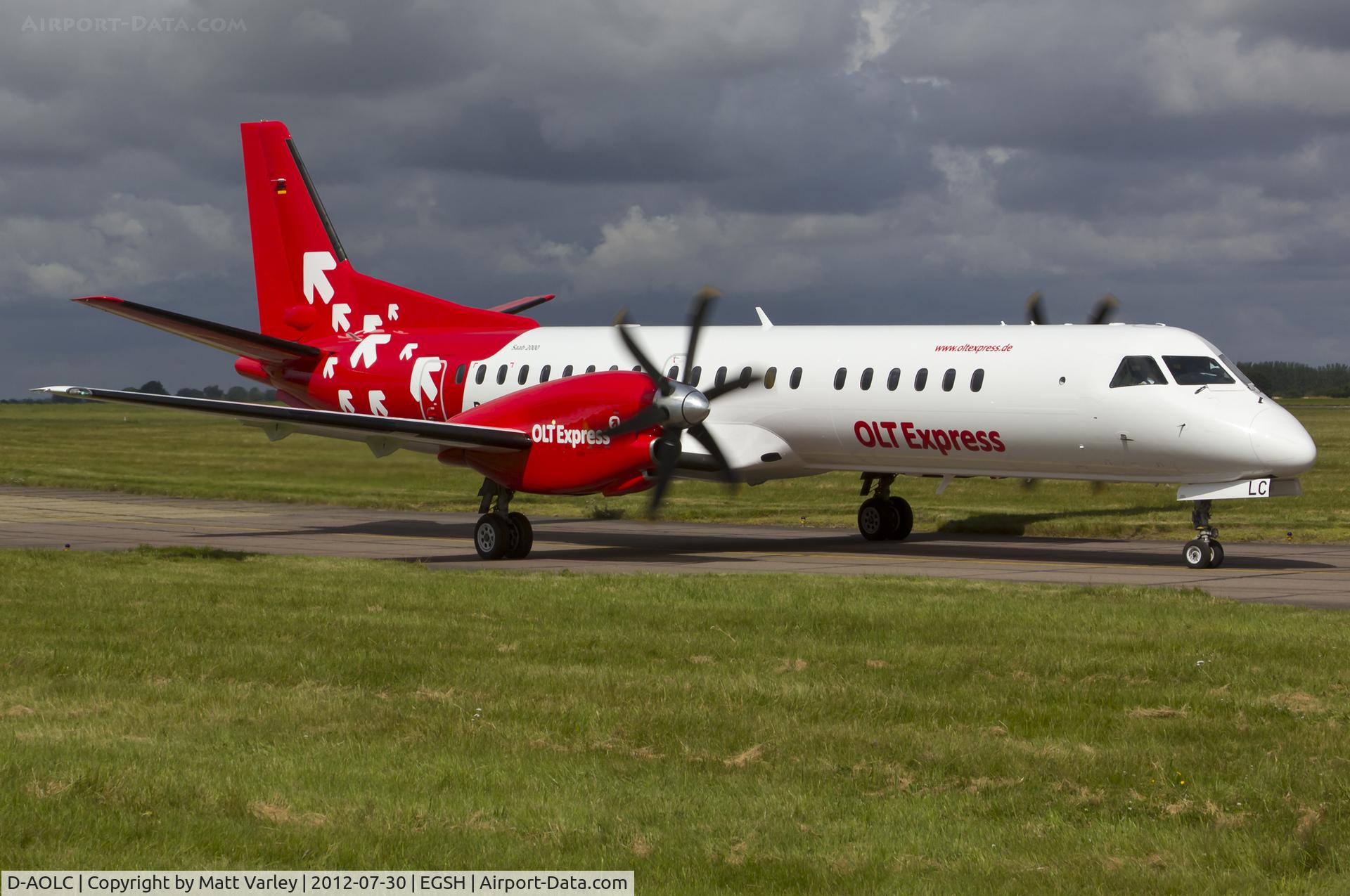 D-AOLC, 1995 Saab 2000 C/N 2000-016, About to depart EGSH after spray by Air Livery.
