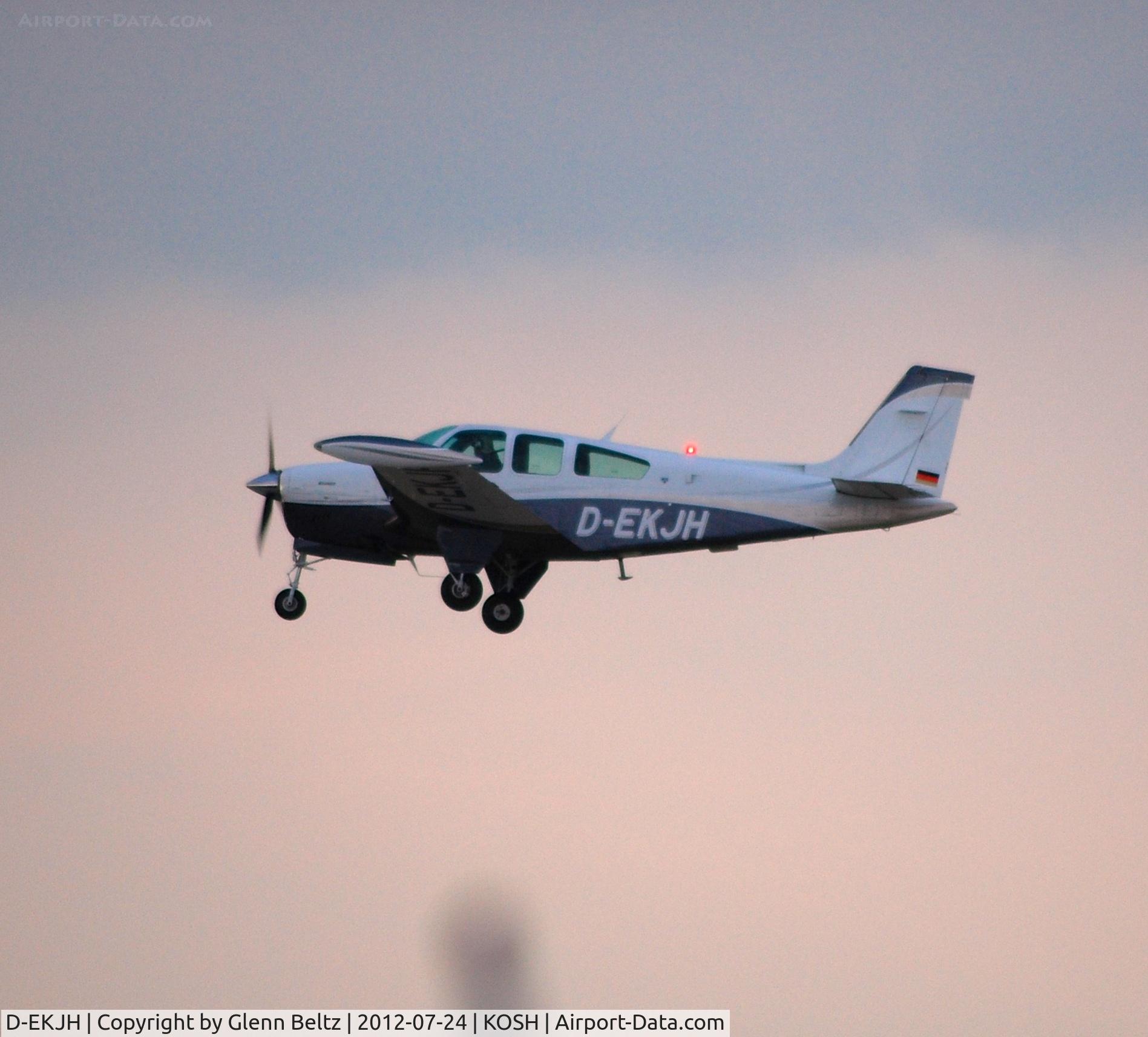 D-EKJH, 1987 Beech F33A Bonanza Bonanza C/N CE-1125, Departing EAA Airventure/Oshkosh on 24 July 2012