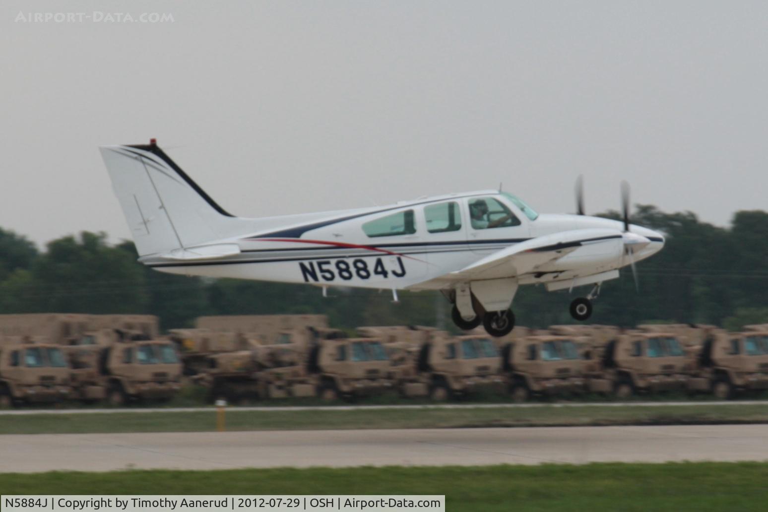 N5884J, 1965 Beech 95-B55 (T42A) Baron C/N TC-926, Departing Airventure 2012
