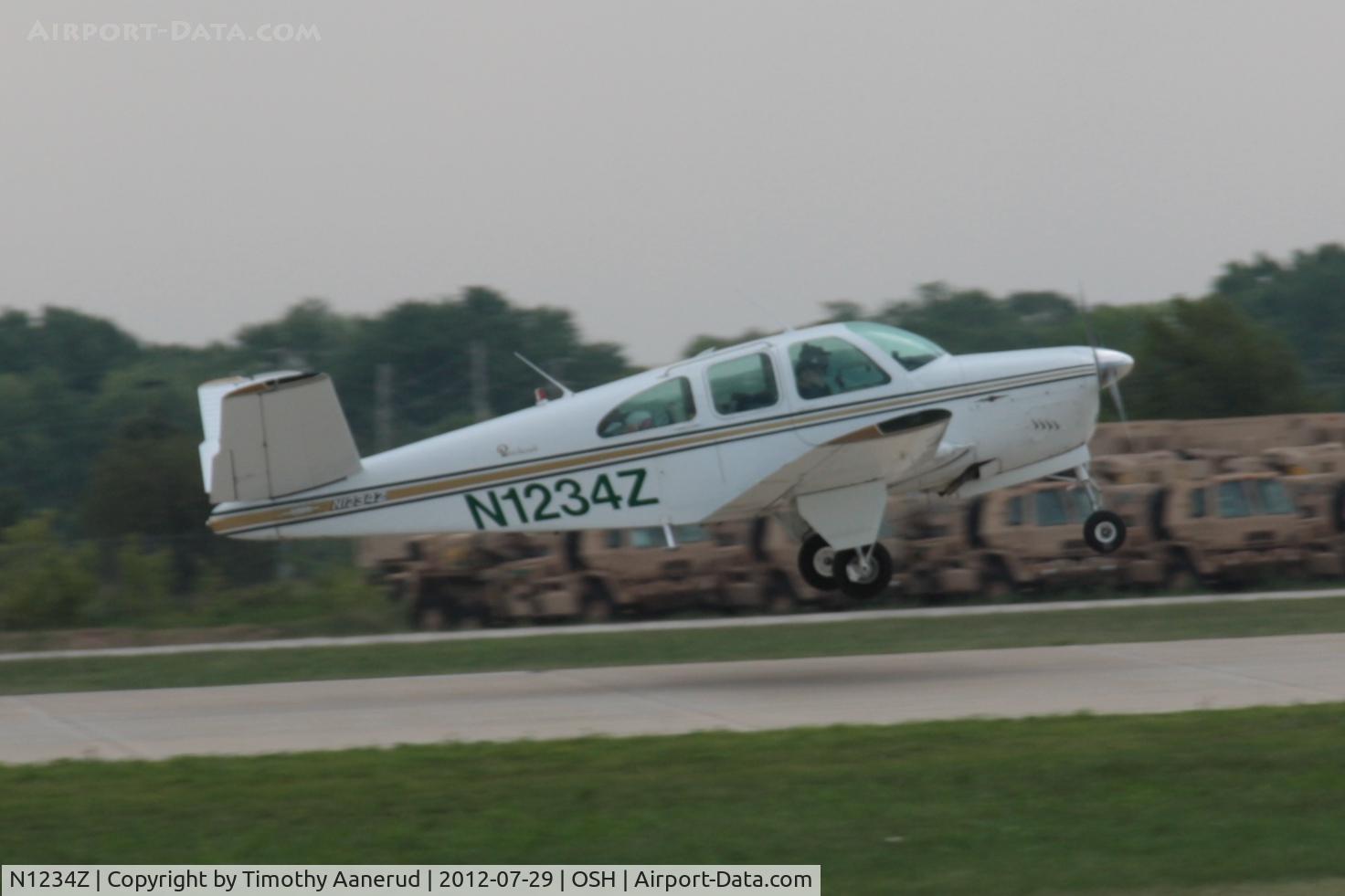 N1234Z, 1961 Beech N35 Bonanza C/N D-6695, Departing Airventure 2012