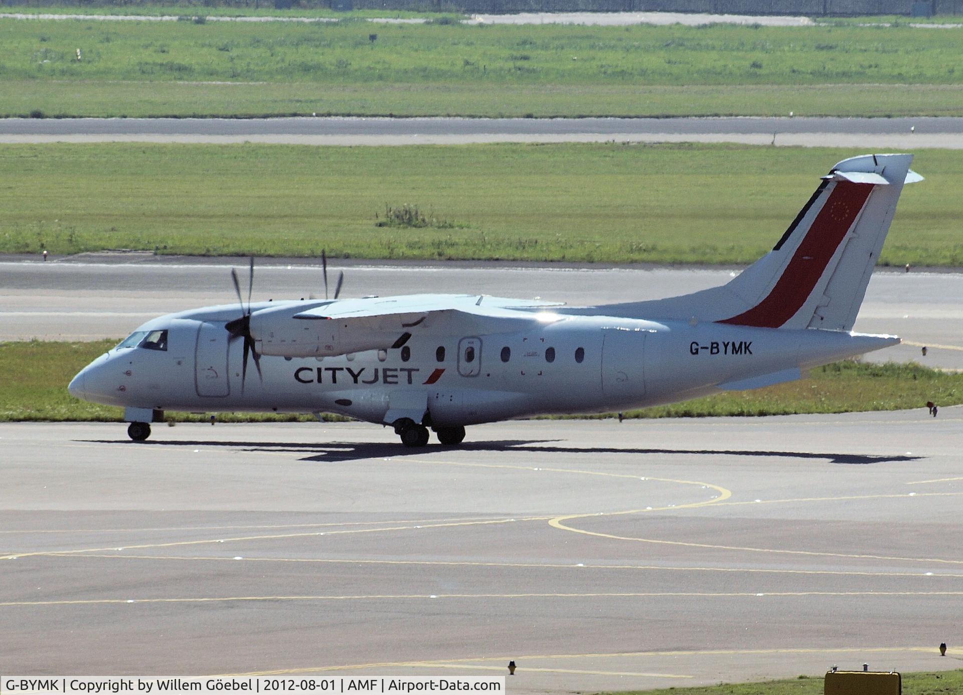 G-BYMK, 1996 Dornier 328-100 C/N 3062, Taxi to runway 24 of Amsterdam Airport now fly for CityJet