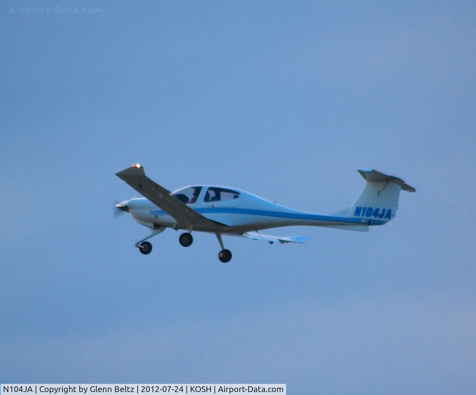 N104JA, 2004 Diamond DA-40 Diamond Star C/N 40.440, Departing EAA Airventure/Oshkosh on 24 July 2012.