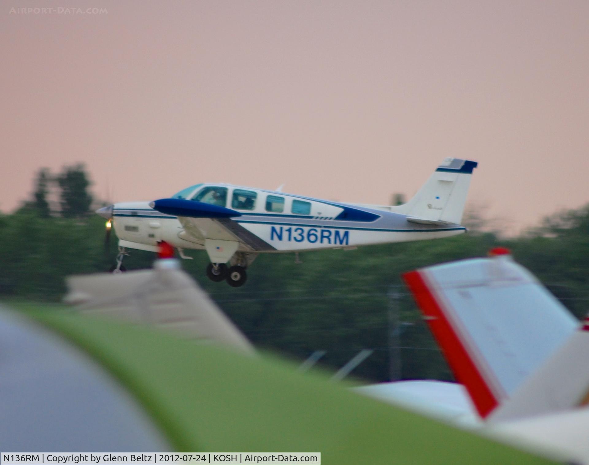 N136RM, 1980 Beech A36TC Bonanza 36 C/N EA97, Departing EAA Airventure/Oshkosh on 24 July 2012.