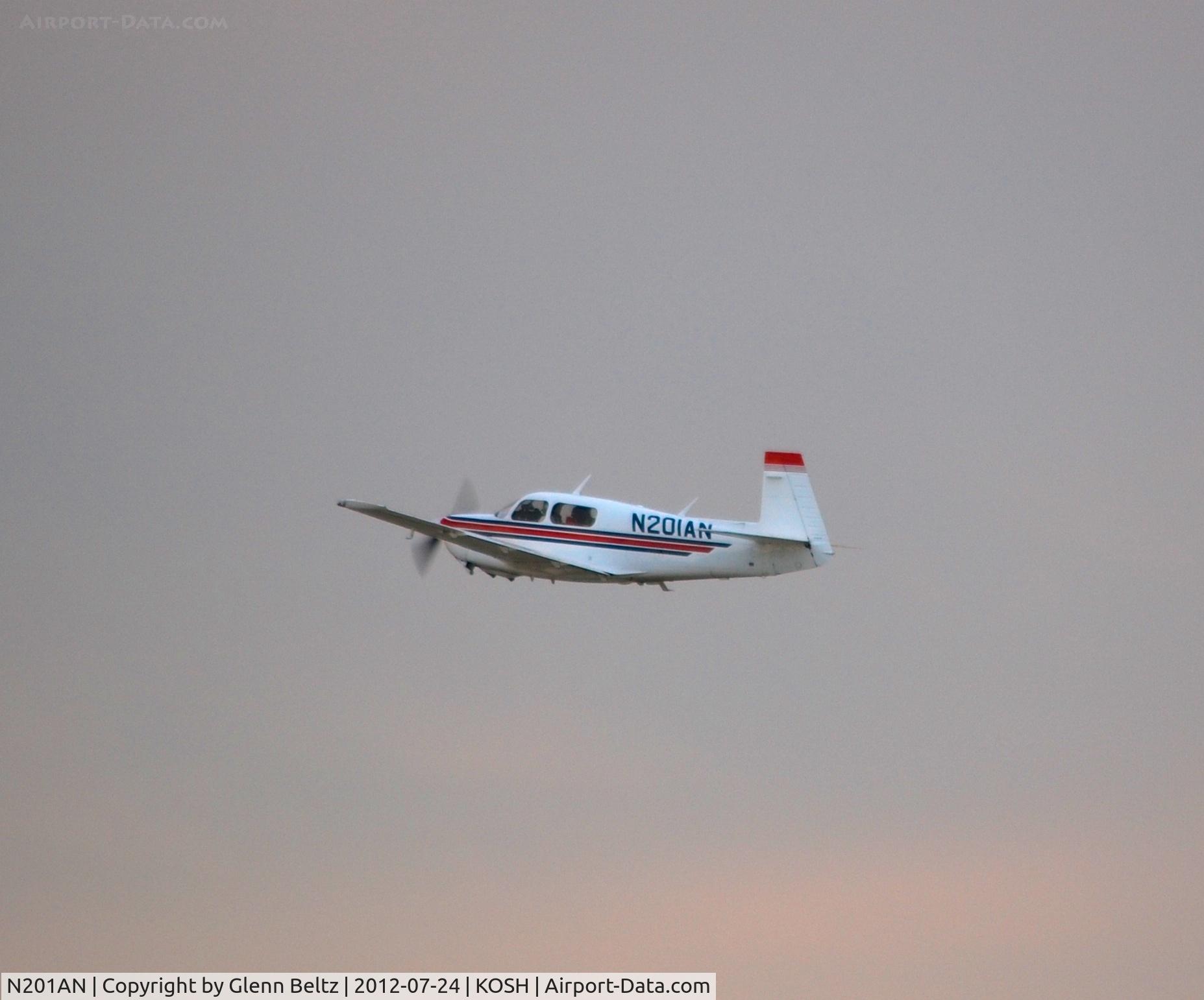 N201AN, 1994 Mooney M20J 201 C/N 24-3351, Departing EAA Airventure/Oshkosh on 24 July 2012.