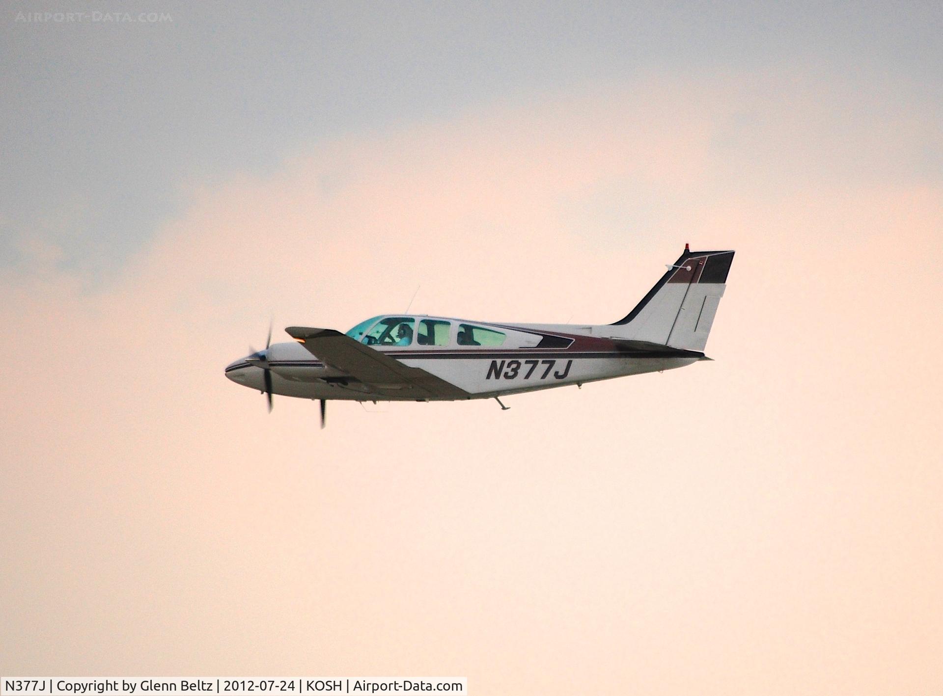 N377J, 1966 Beech C55 Baron (95-C55) C/N TE-179, Departing EAA Airventure/Oshkosh on 24 July 2012.