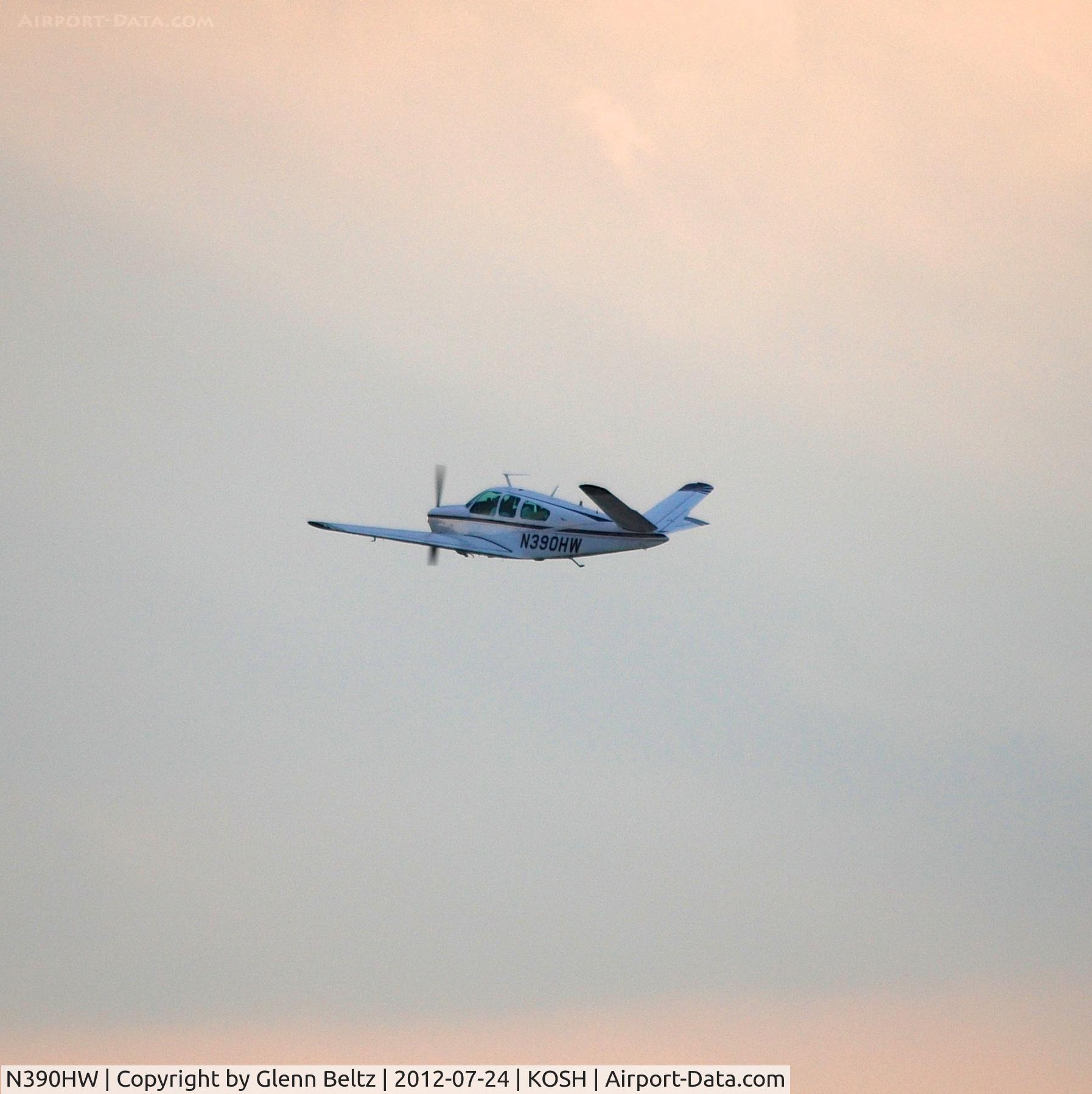 N390HW, 1967 Beech V35A Bonanza C/N D-8608, Departing EAA Airventure/Oshkosh on 24 July 2012.